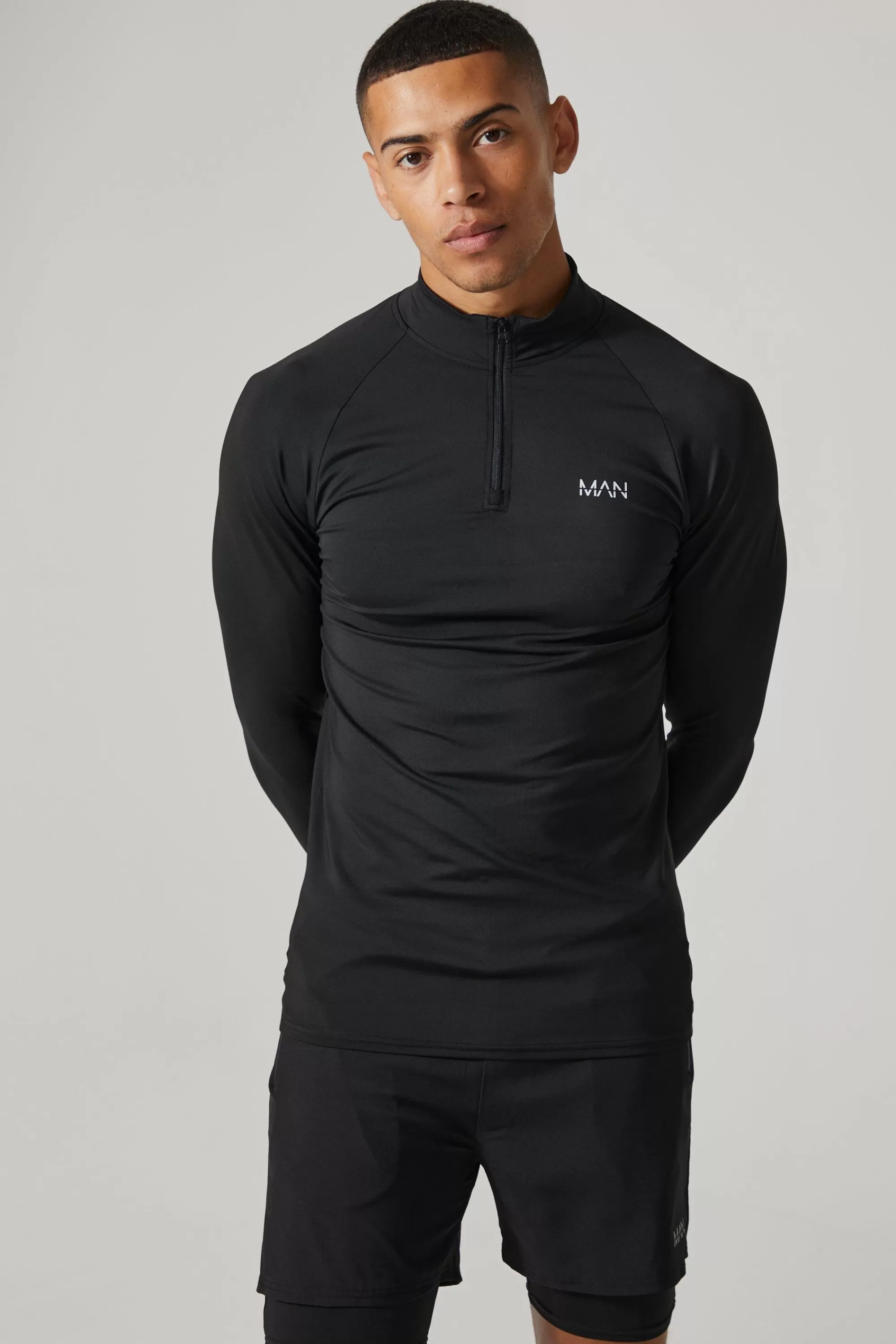 boohooMAN Man Active Raglan Muscle Fit 1/4 Zip Top | UK