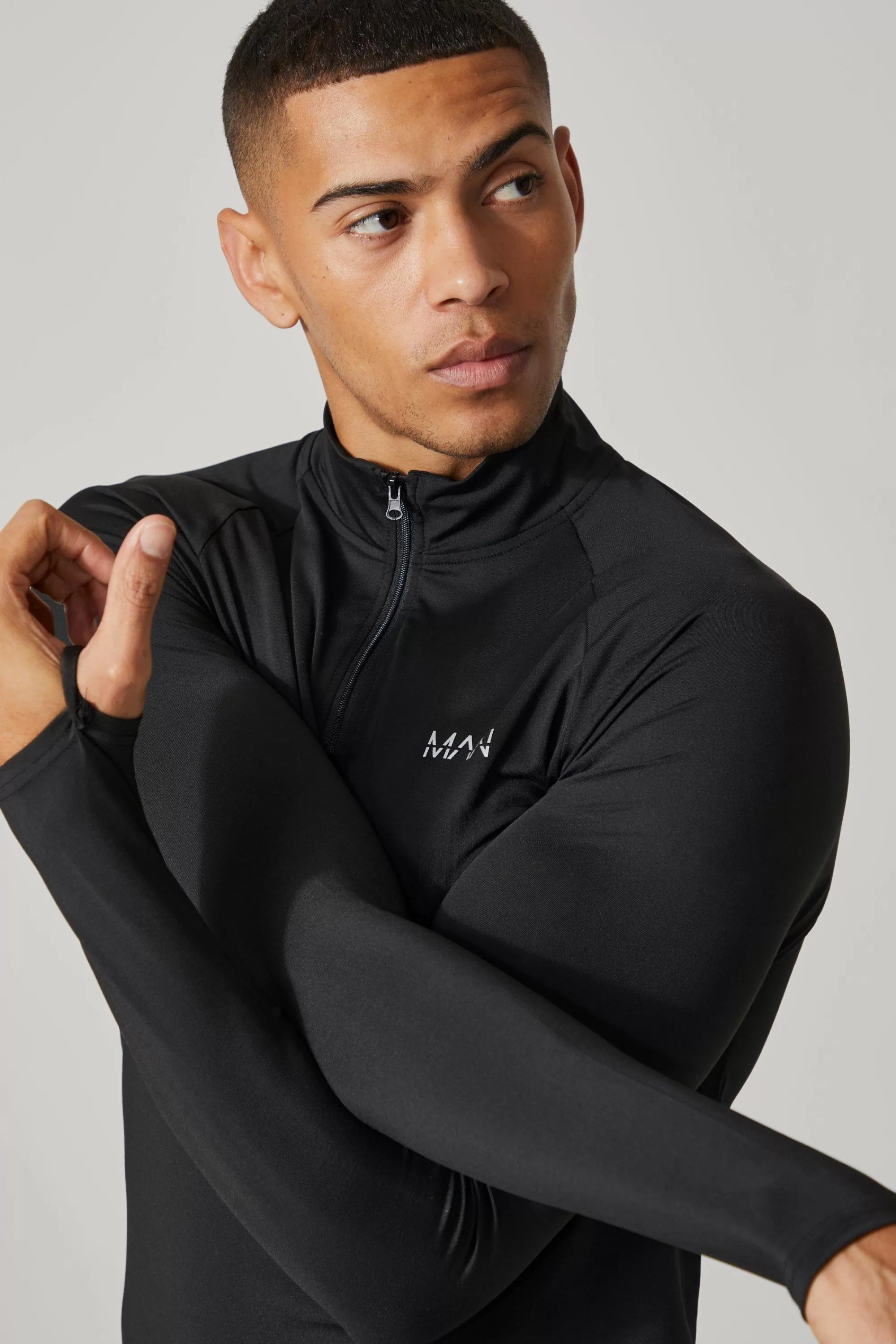boohooMAN Man Active Raglan Muscle Fit 1/4 Zip Top | UK