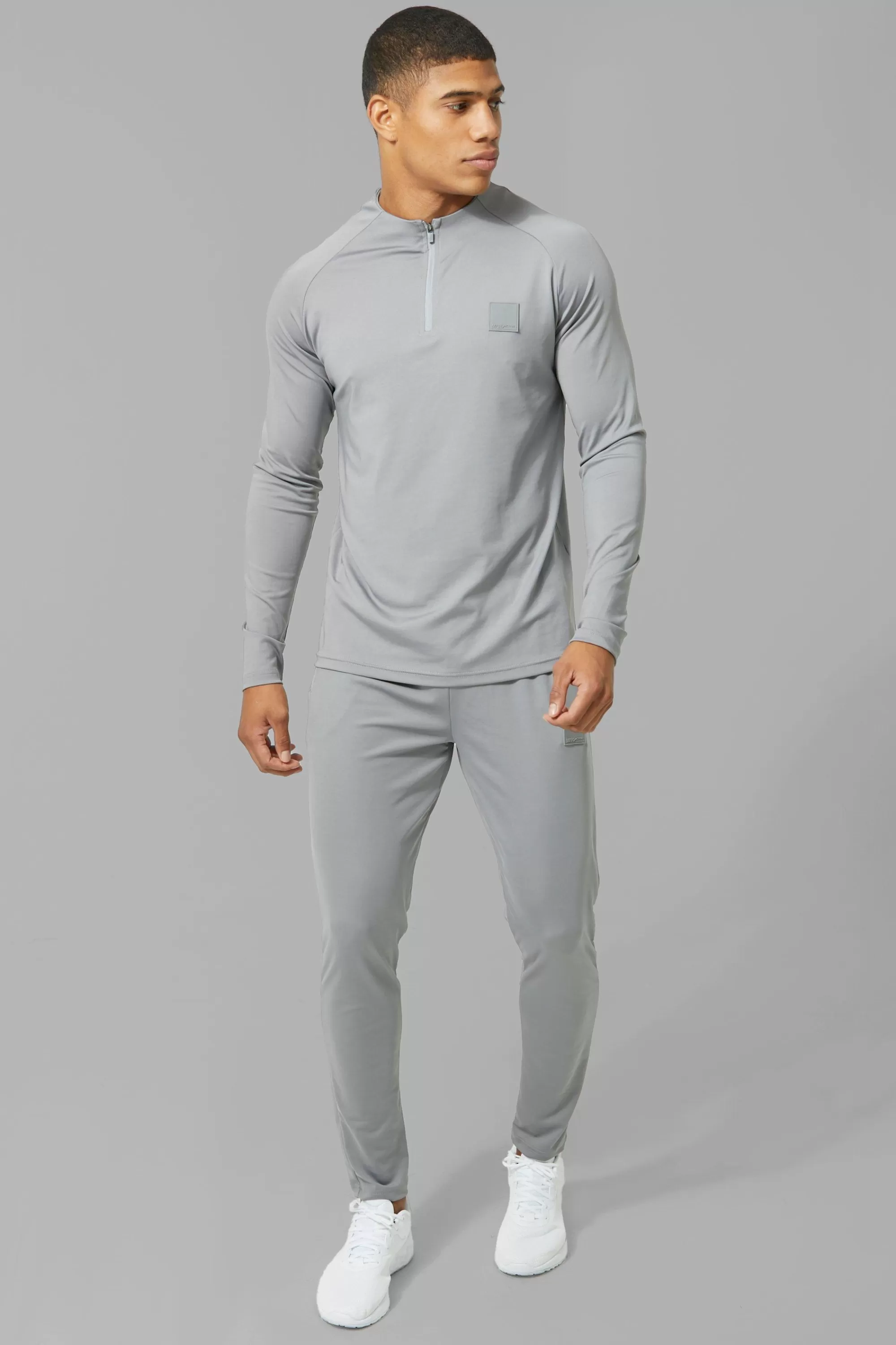 boohooMAN Man Active Skinny Crew Neck 1/4 Zip Tracksuit | UK