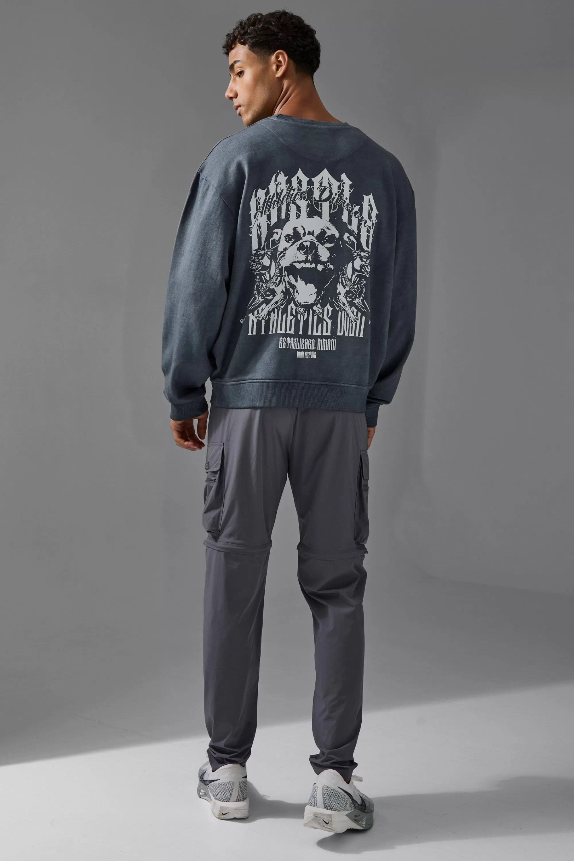boohooMAN Man Active Washed Graphic Boxy Sweatshirt | UK