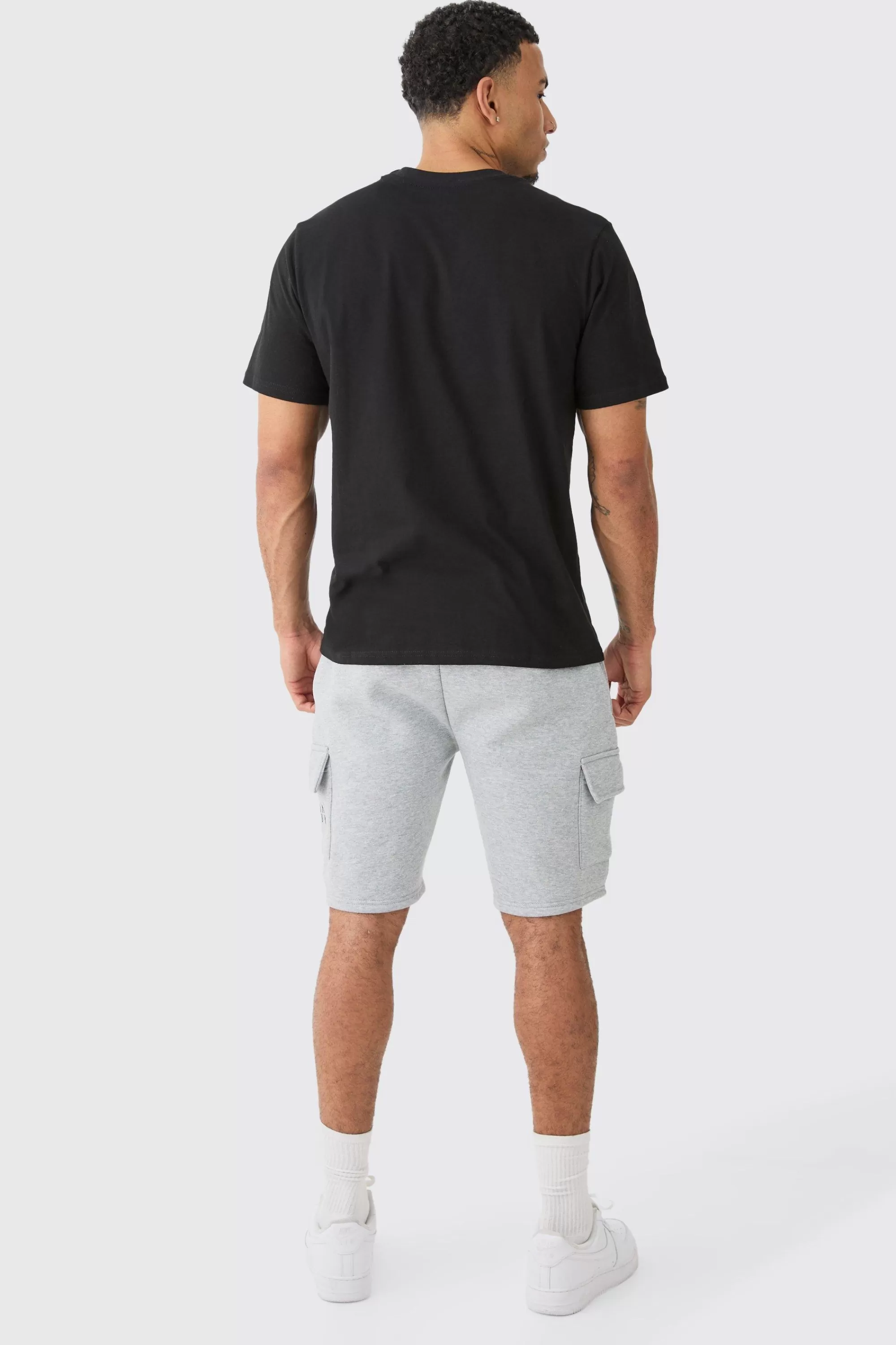 boohooMAN Man Dash Loose Fit Mid Length Cargo Short | UK