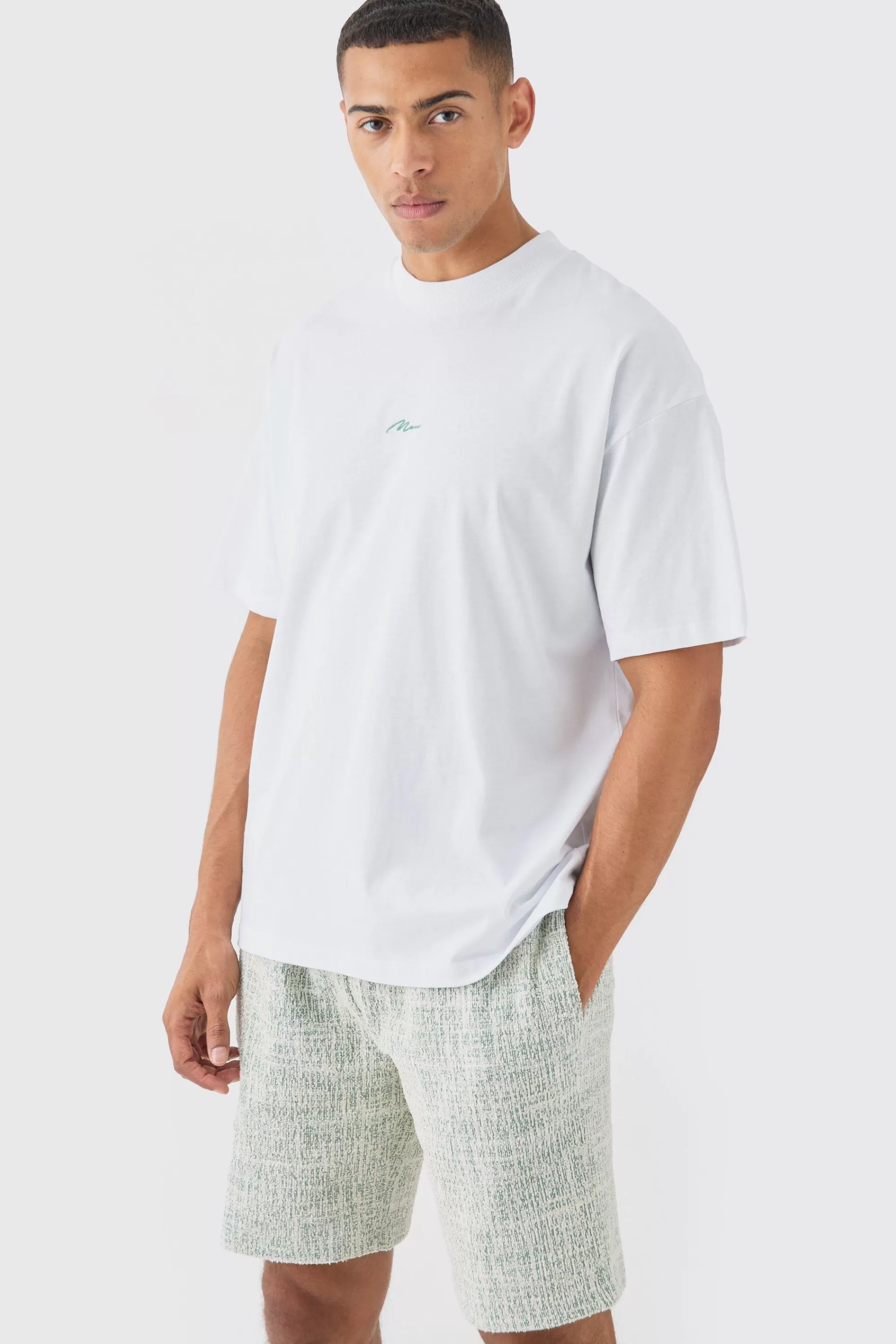 boohooMAN Man Oversized Extended Neck T-shirt And Textured Shorts Set | UK