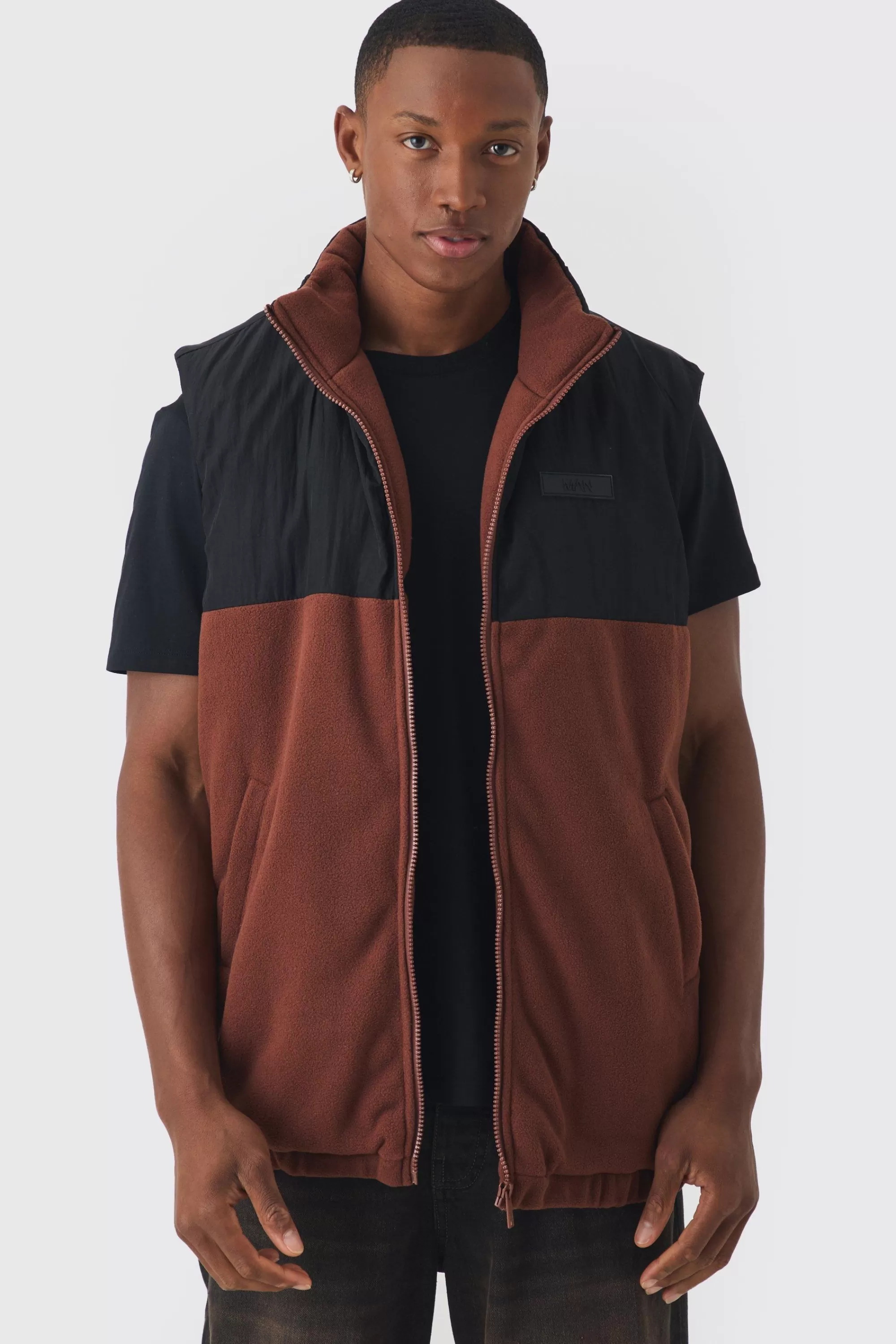 boohooMAN Man Tab Boxy Colour Block Fleece Gilet In | UK
