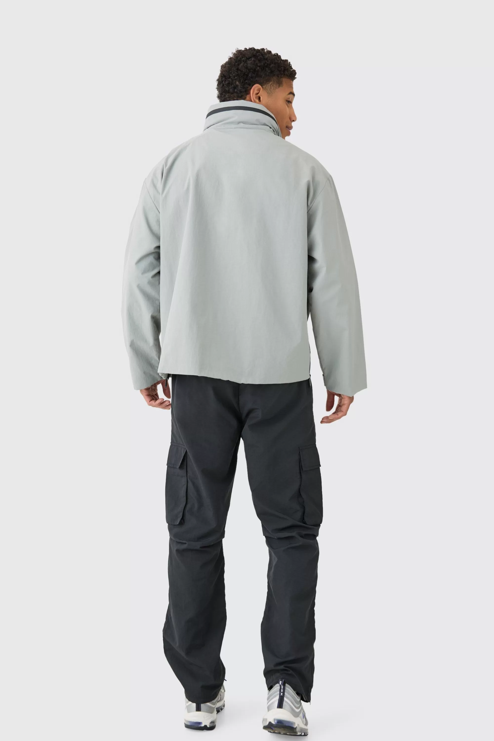 boohooMAN Man Tab Oversized Zip Detail Nylon Windbreaker In | UK