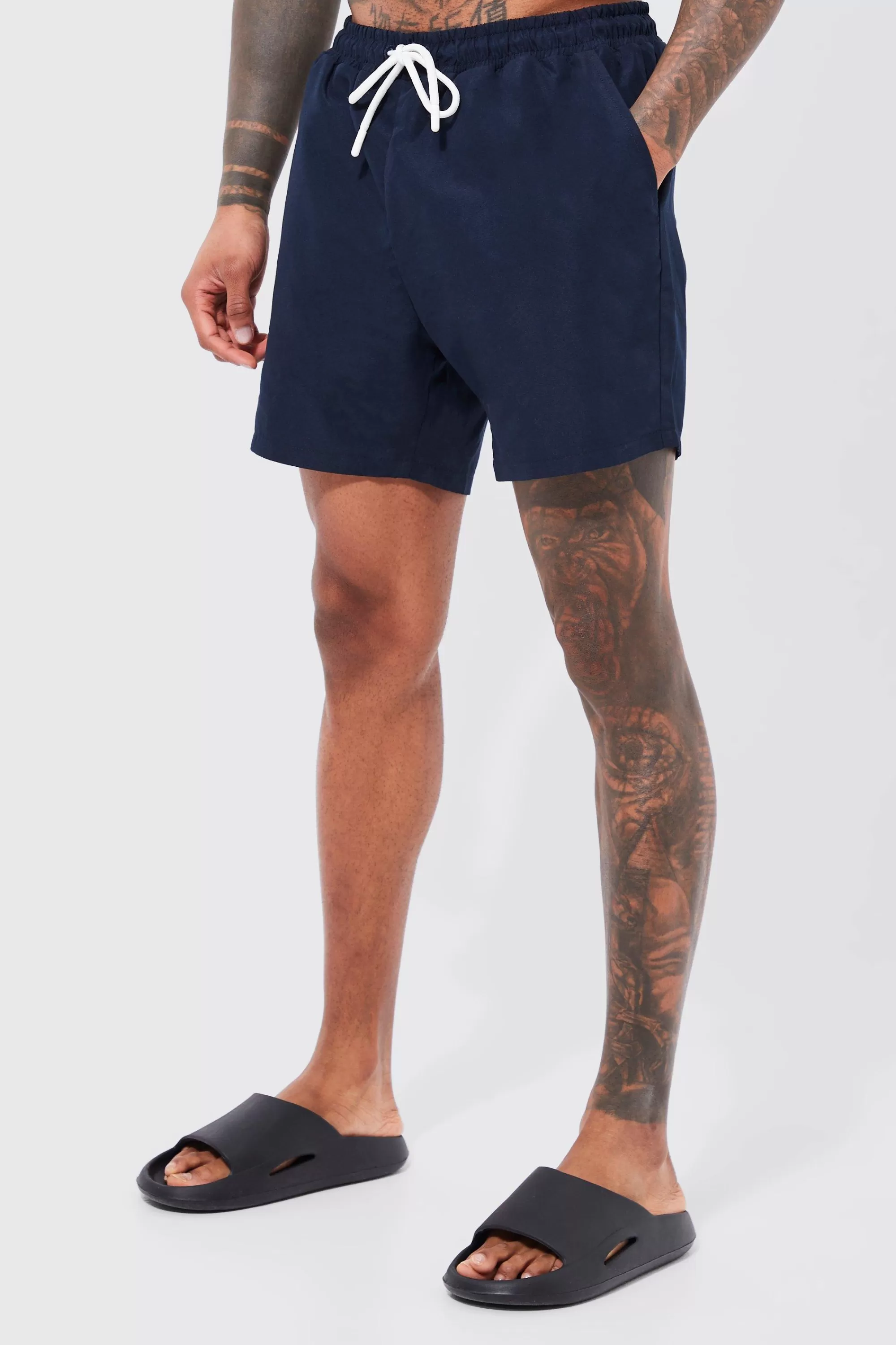 boohooMAN Mid Length Plain Swim Shorts | UK