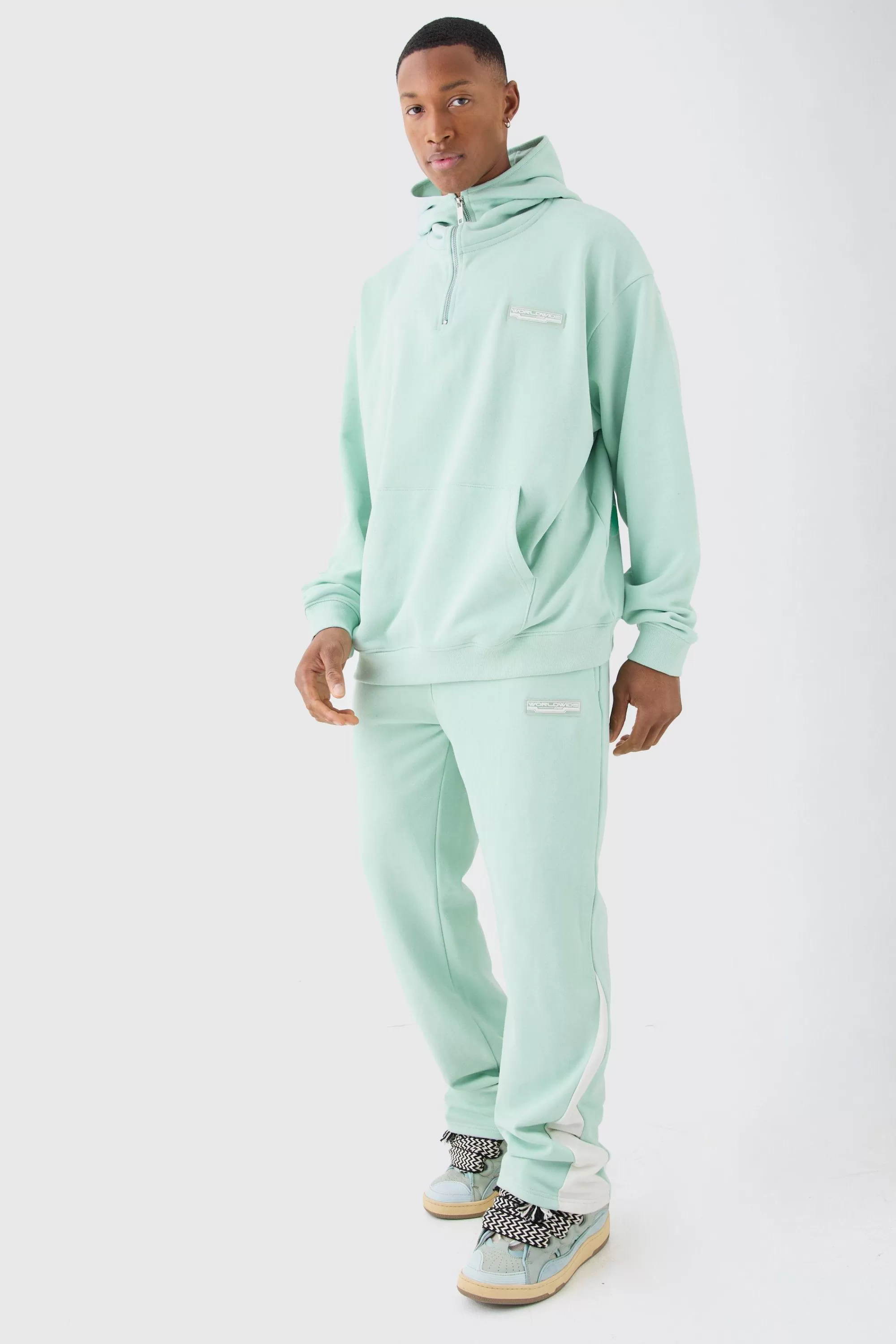 boohooMAN Oversized 1/4 Zip Washed Hooded Loopback Tracksuit | UK