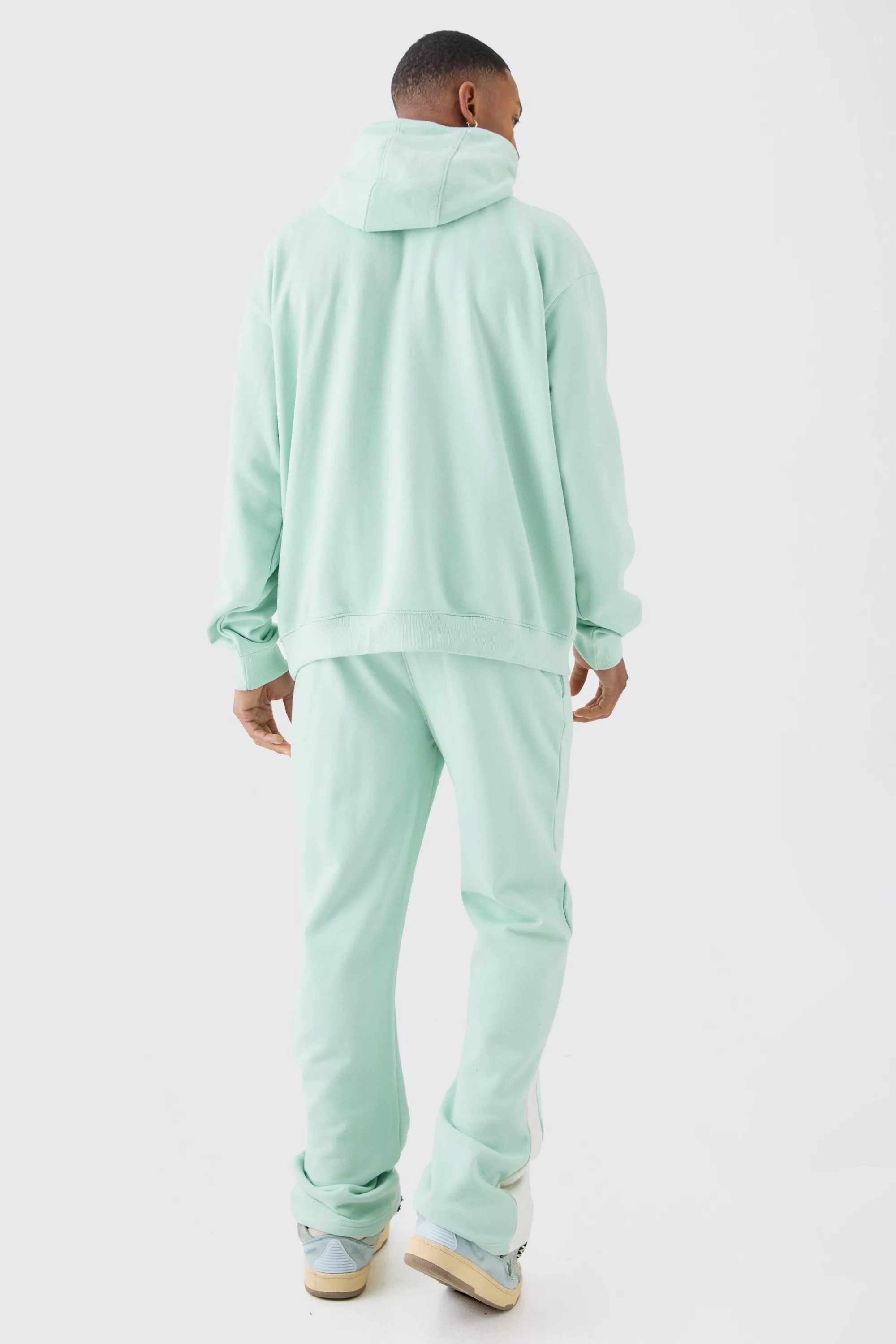 boohooMAN Oversized 1/4 Zip Washed Hooded Loopback Tracksuit | UK