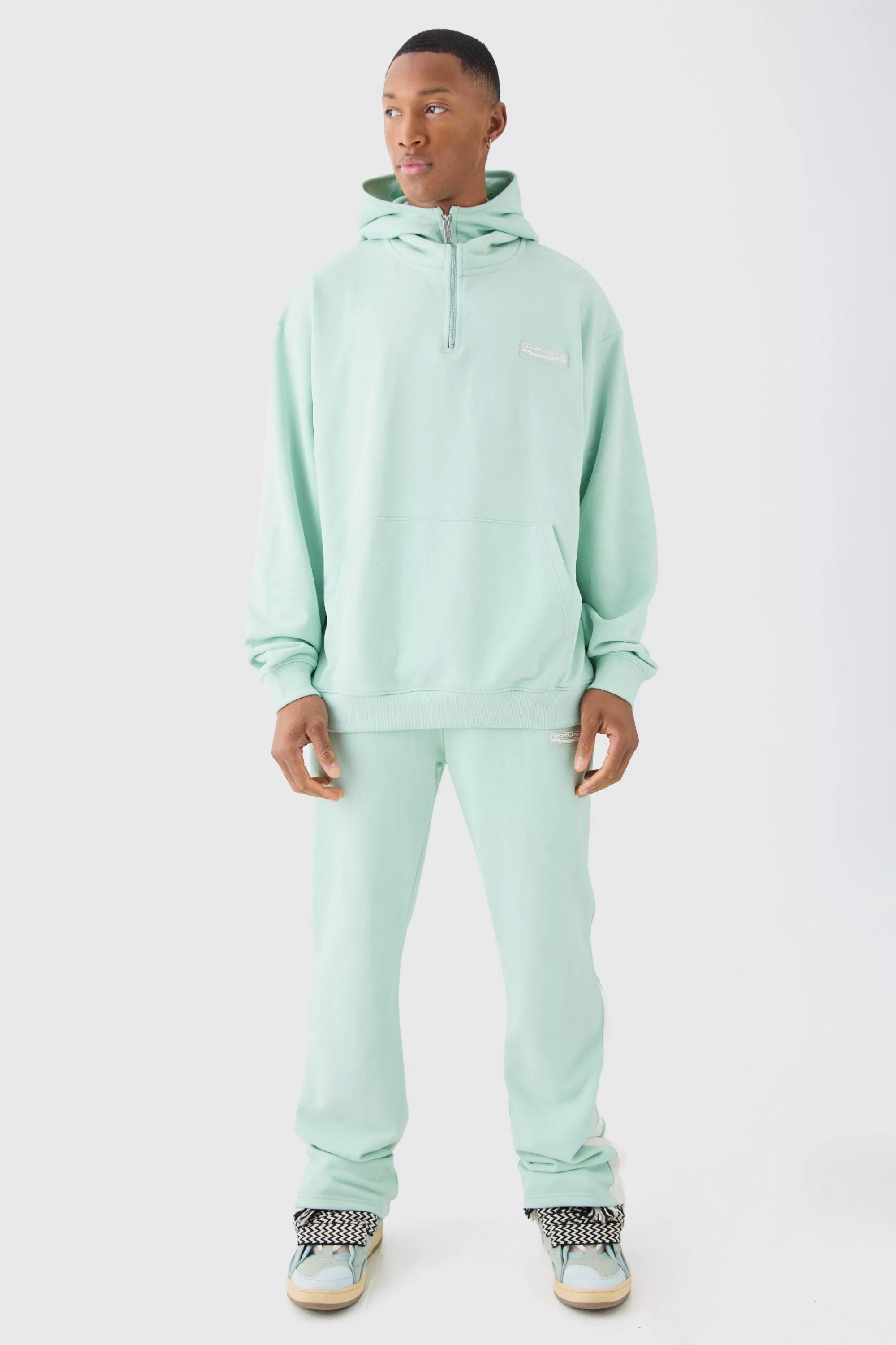 boohooMAN Oversized 1/4 Zip Washed Hooded Loopback Tracksuit | UK