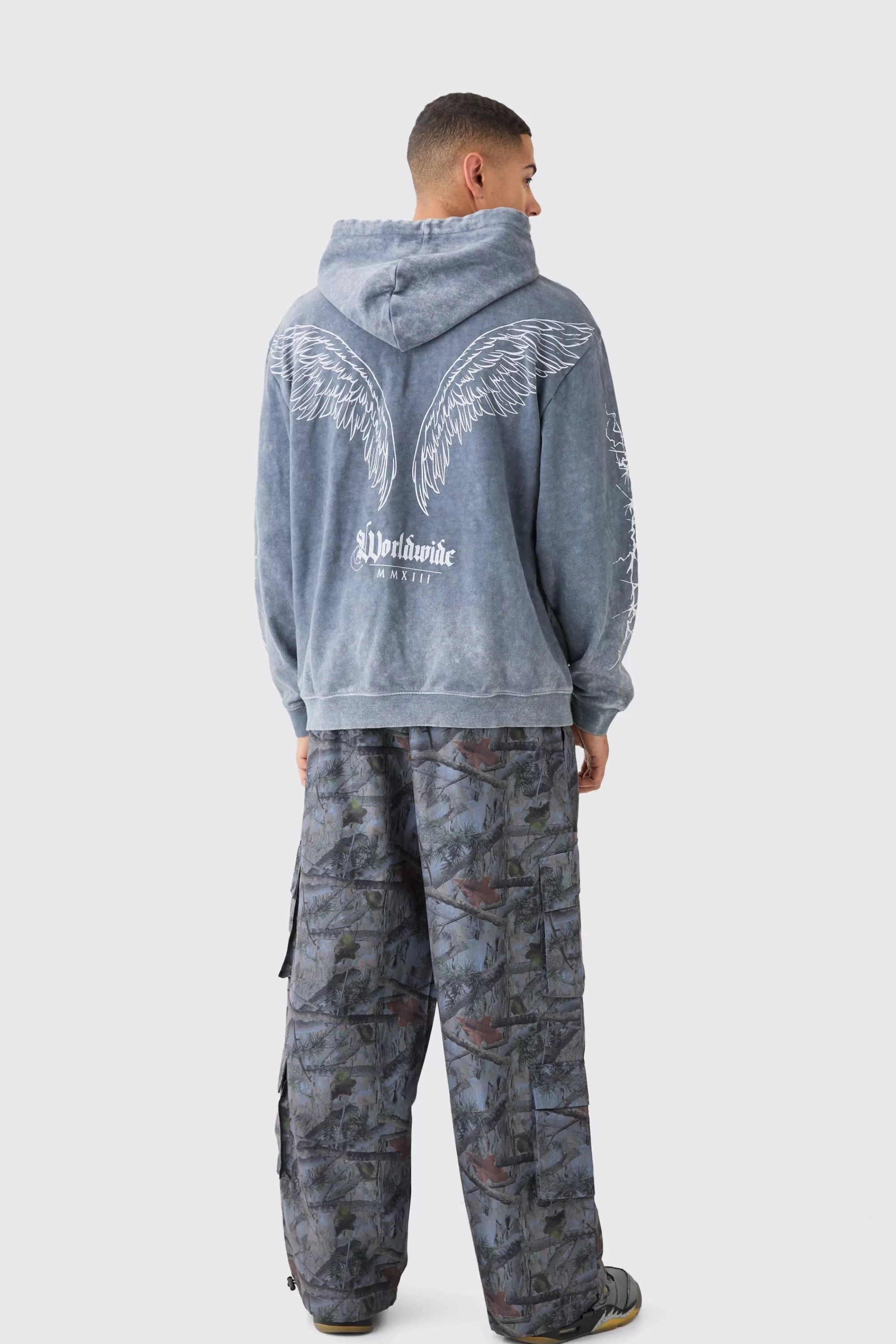 boohooMAN Oversized Acid Wash Embroidered Wing Graphic Hoodie | UK