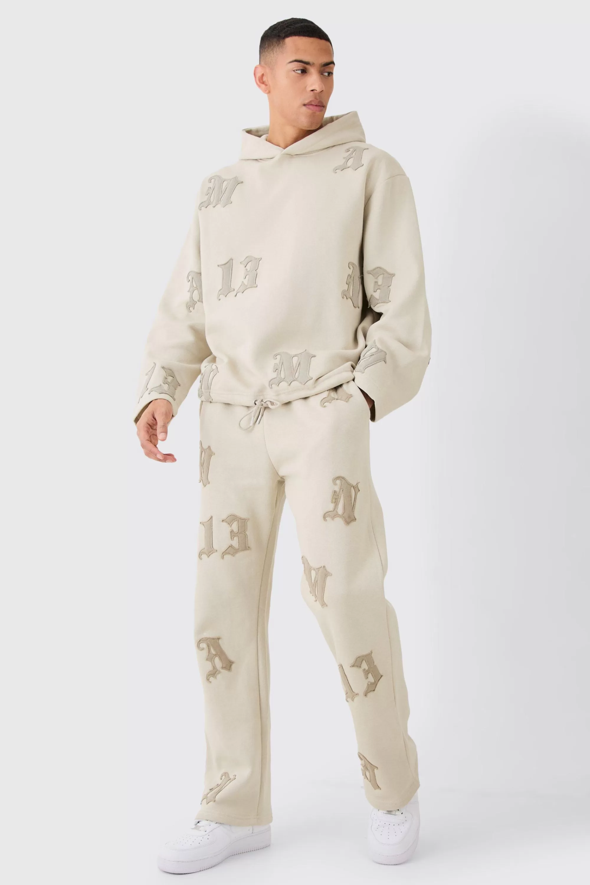 boohooMAN Oversized All Over Applique Open Hem Hoodie | UK