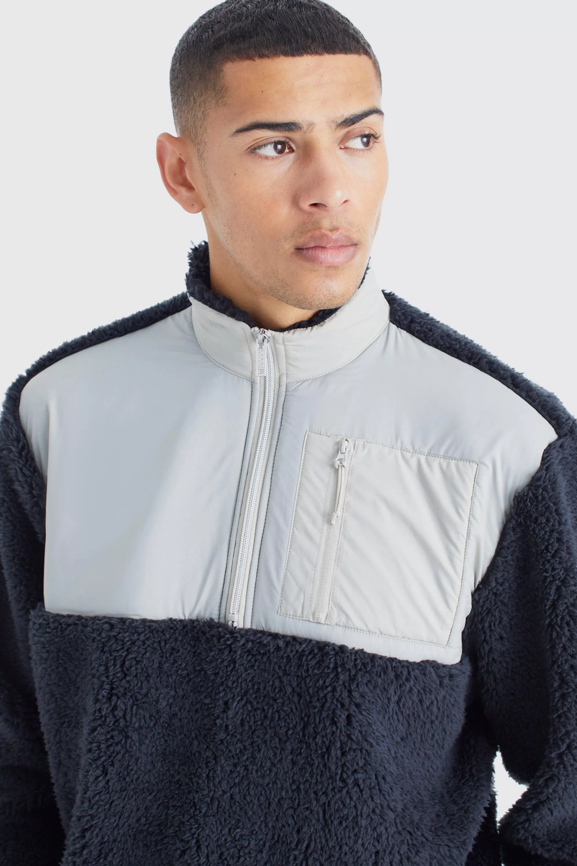 boohooMAN Oversized Boxy 1/4 Zip Nylon Panel Borg Sweatshirt | UK