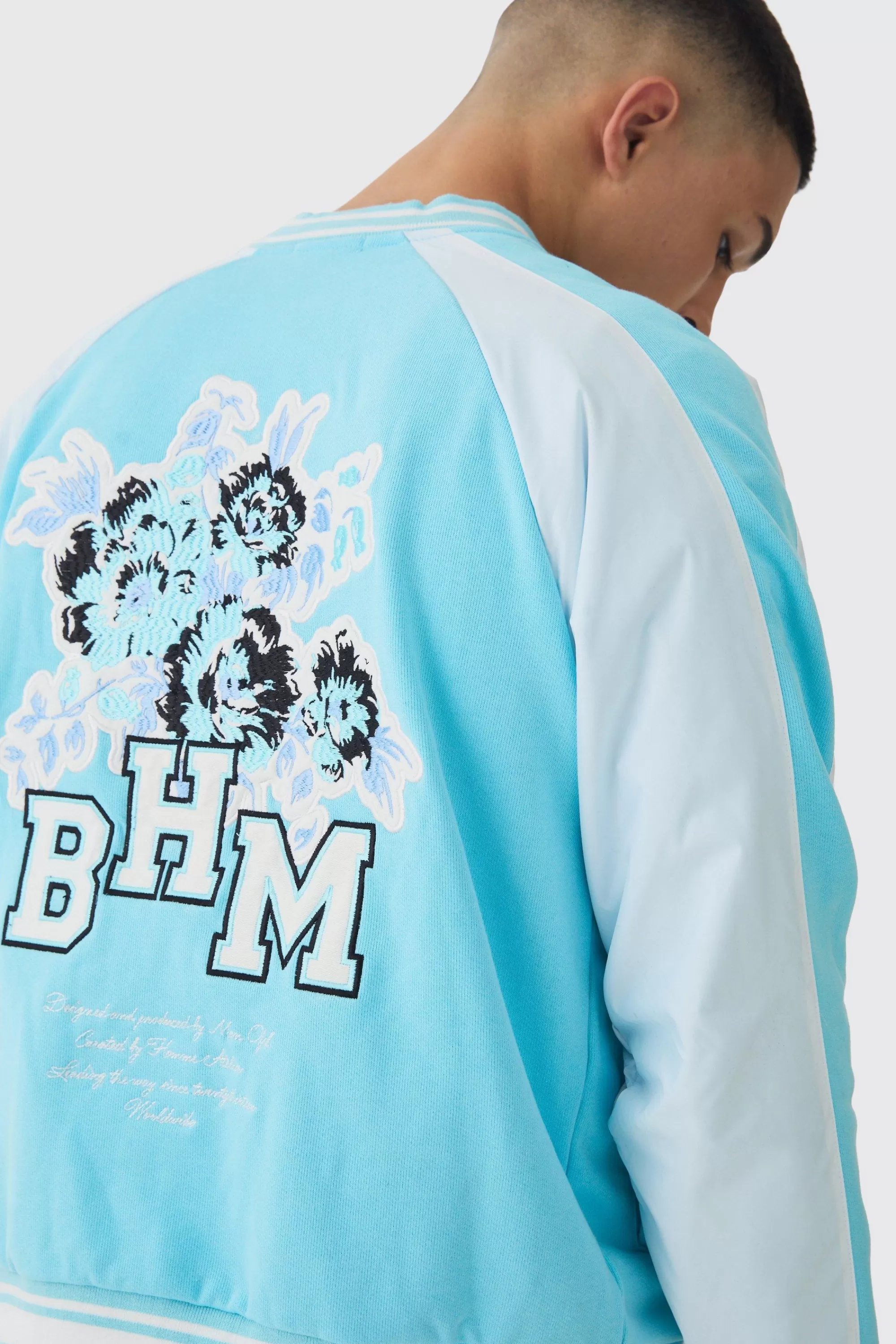 boohooMAN Oversized Boxy Floral Applique Jersey Varsity Jacket | UK