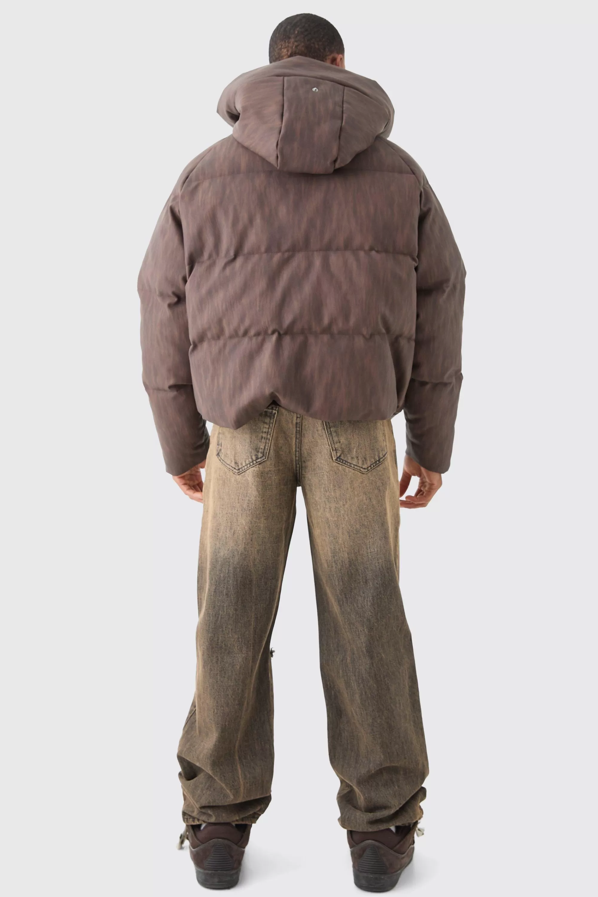 boohooMAN Oversized Boxy Washed Pu Hooded Puffer Coat In | UK