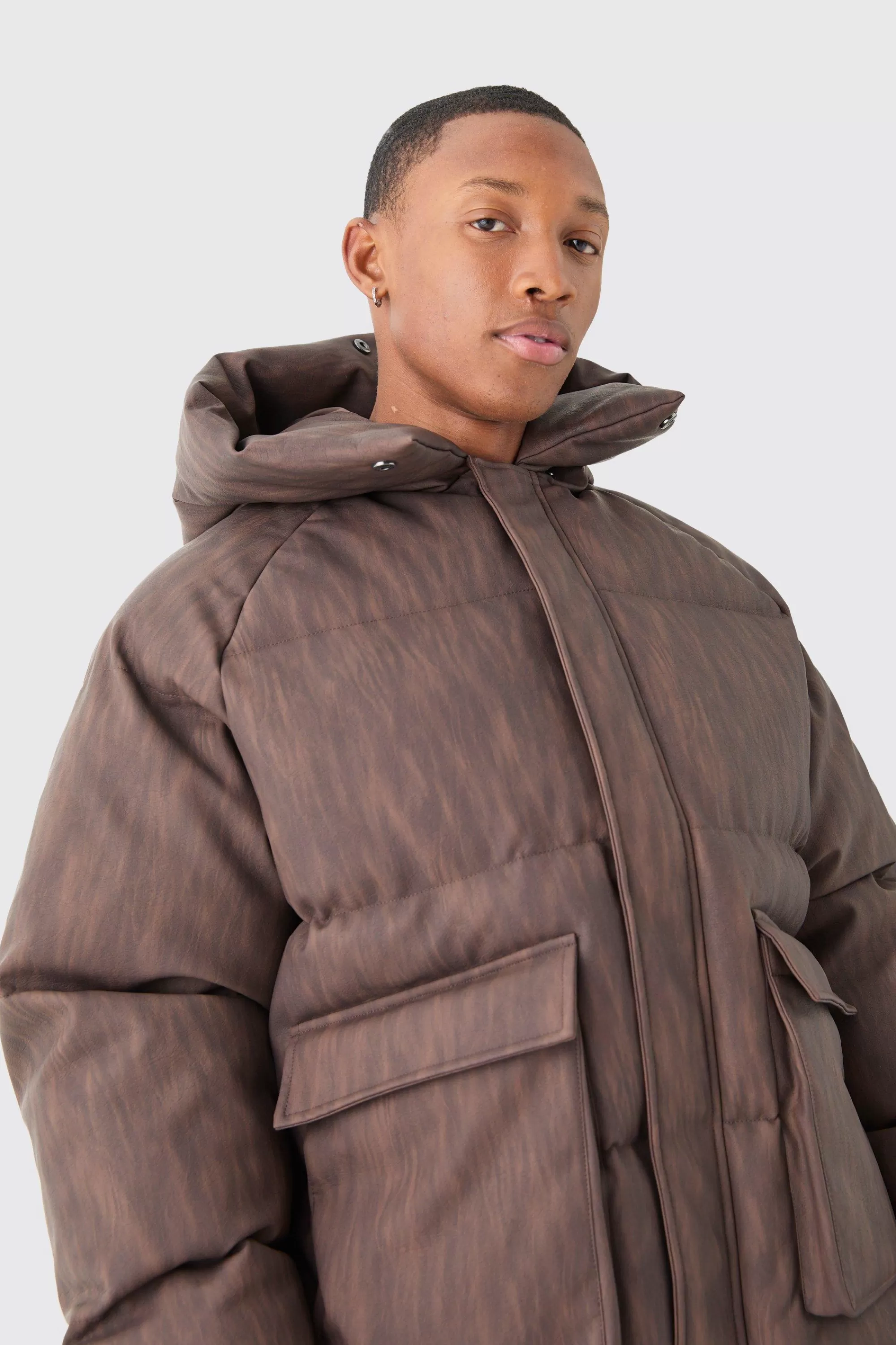 boohooMAN Oversized Boxy Washed Pu Hooded Puffer Coat In | UK