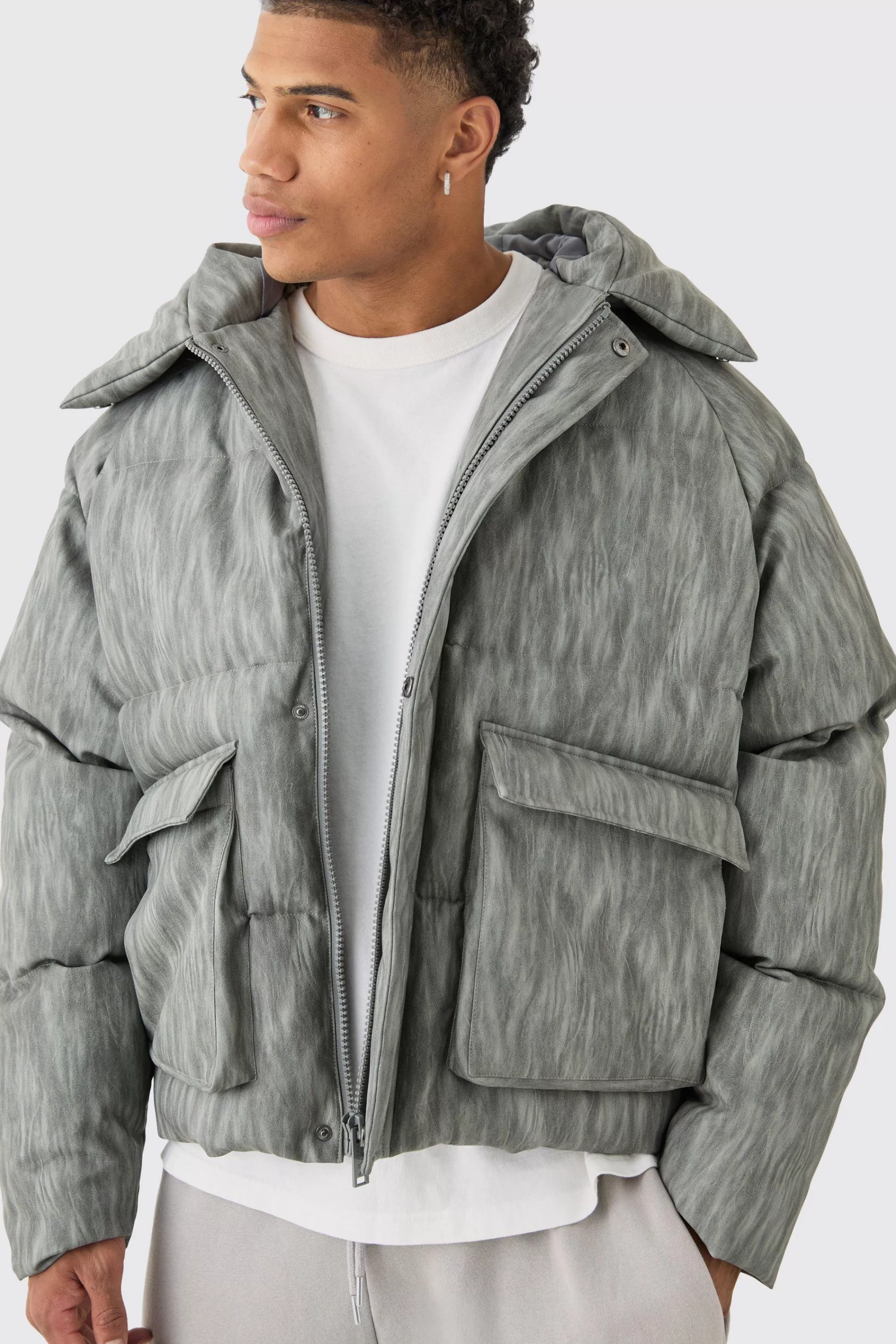 boohooMAN Oversized Boxy Washed Pu Hooded Puffer Coat In | UK