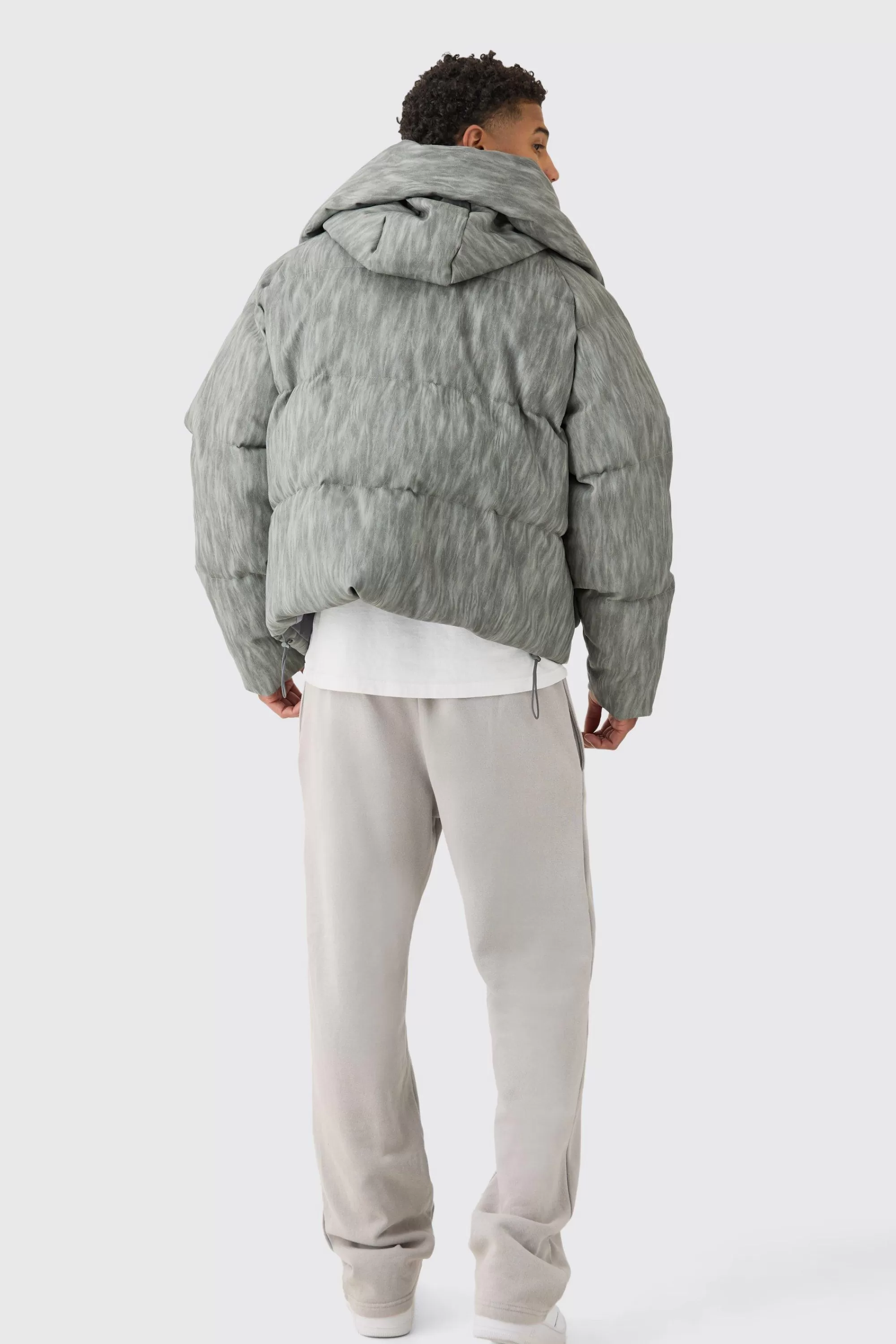 boohooMAN Oversized Boxy Washed Pu Hooded Puffer Coat In | UK