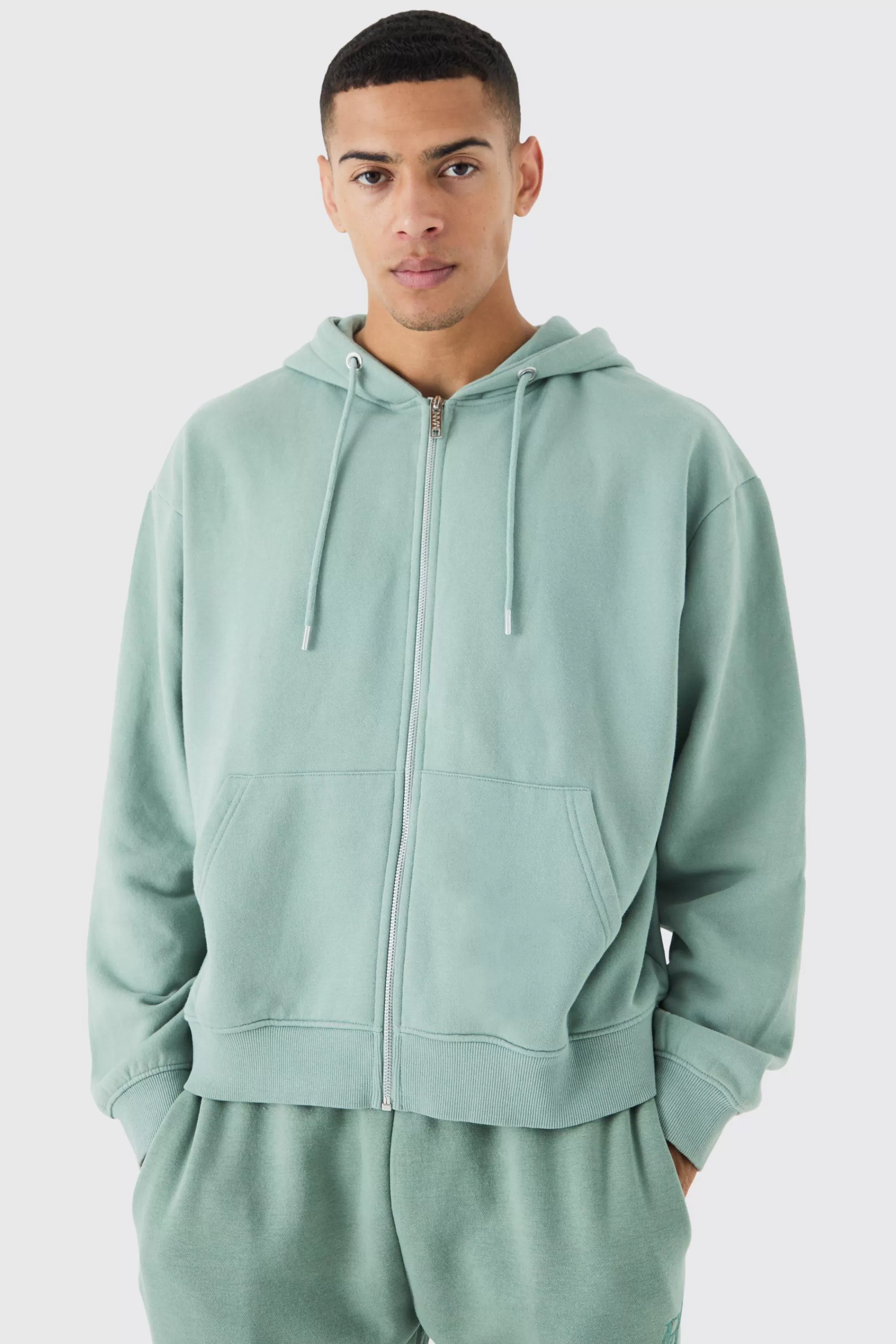 boohooMAN Oversized Boxy Zip Through Washed Hoodie | UK