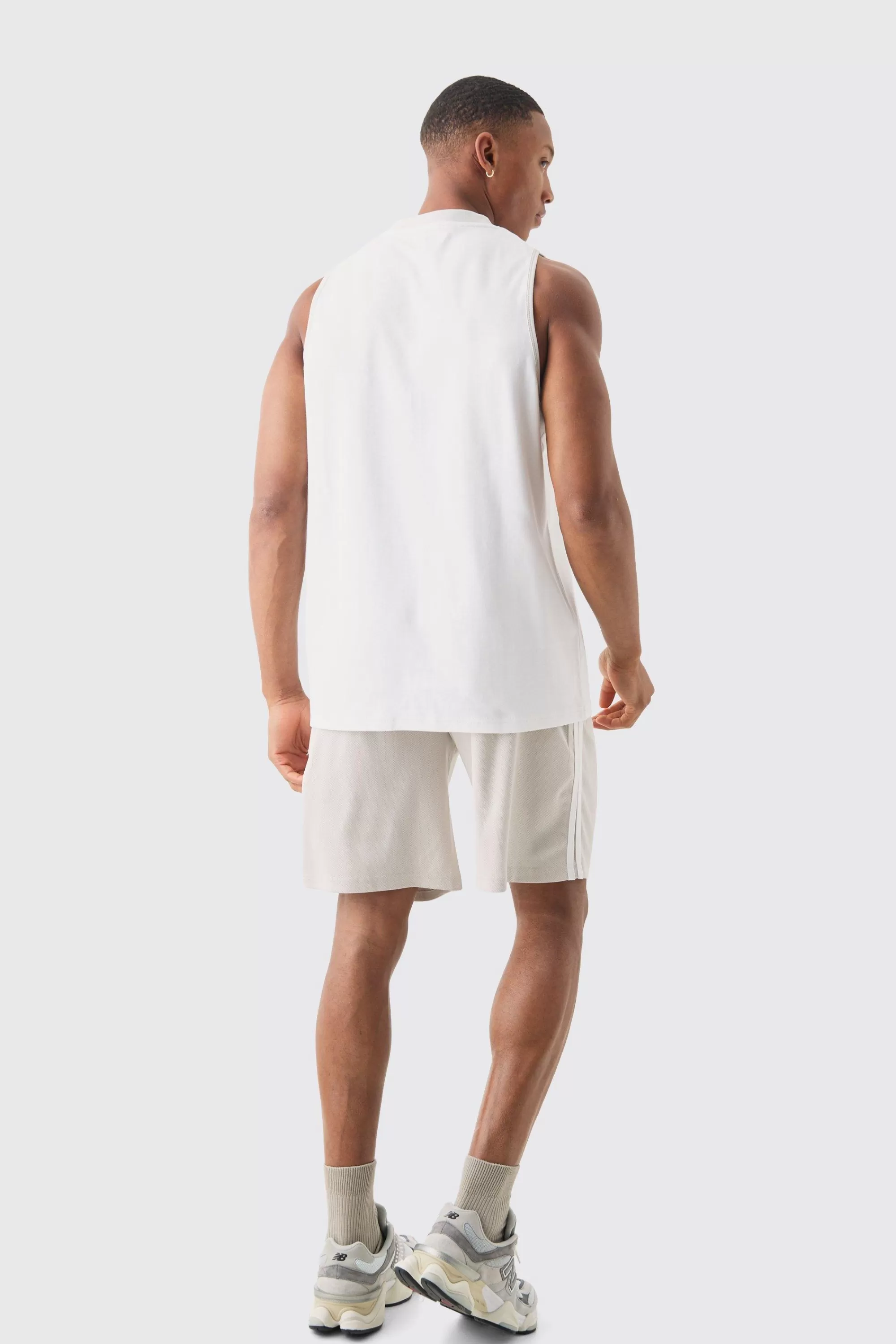 boohooMAN Oversized Bugs Bunny Looney Tunes License Mesh Vest And Short Set | UK