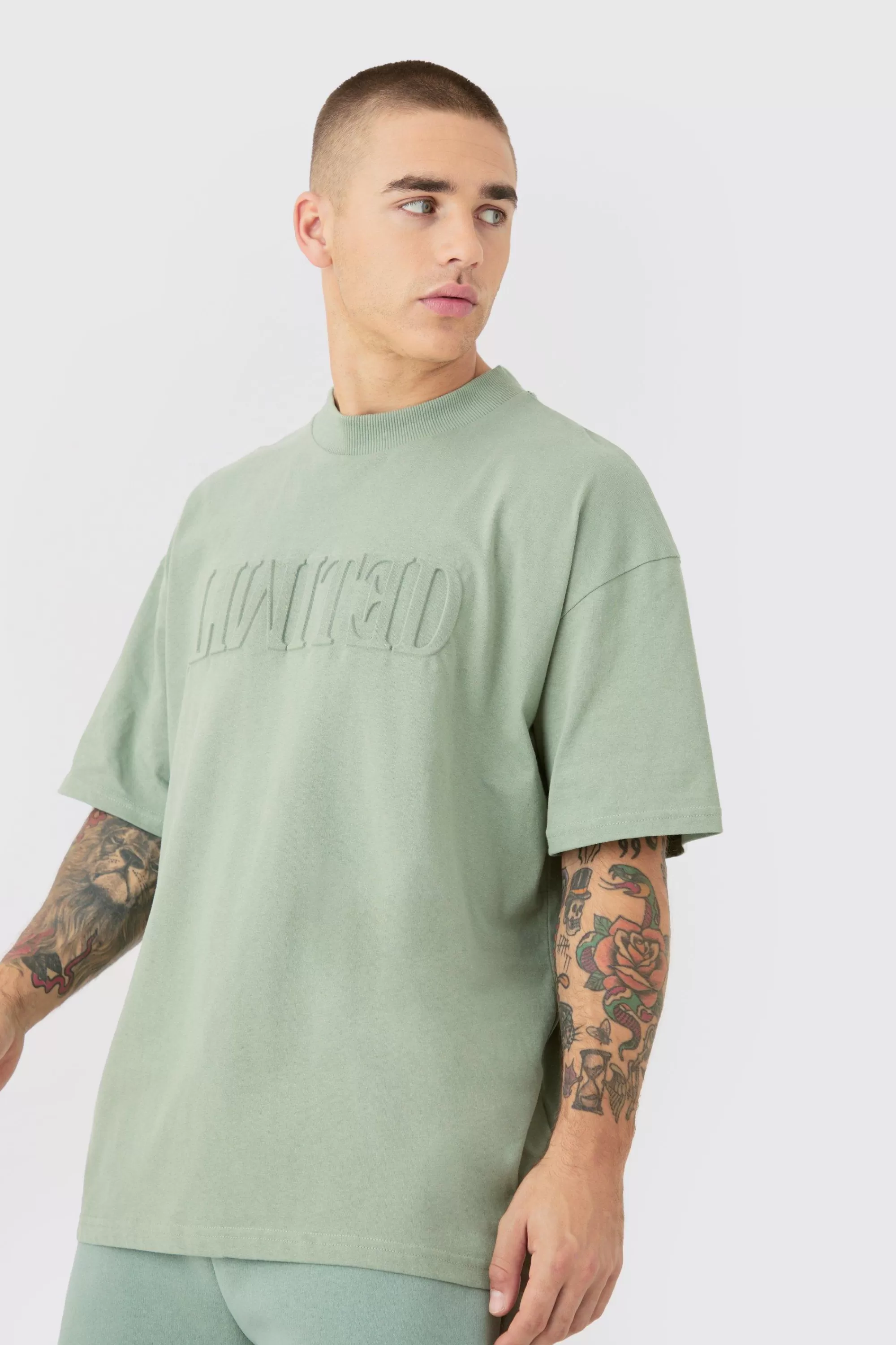 boohooMAN Oversized Extended Neck Limited Embossed T-shirt And Relaxed Short Set | UK