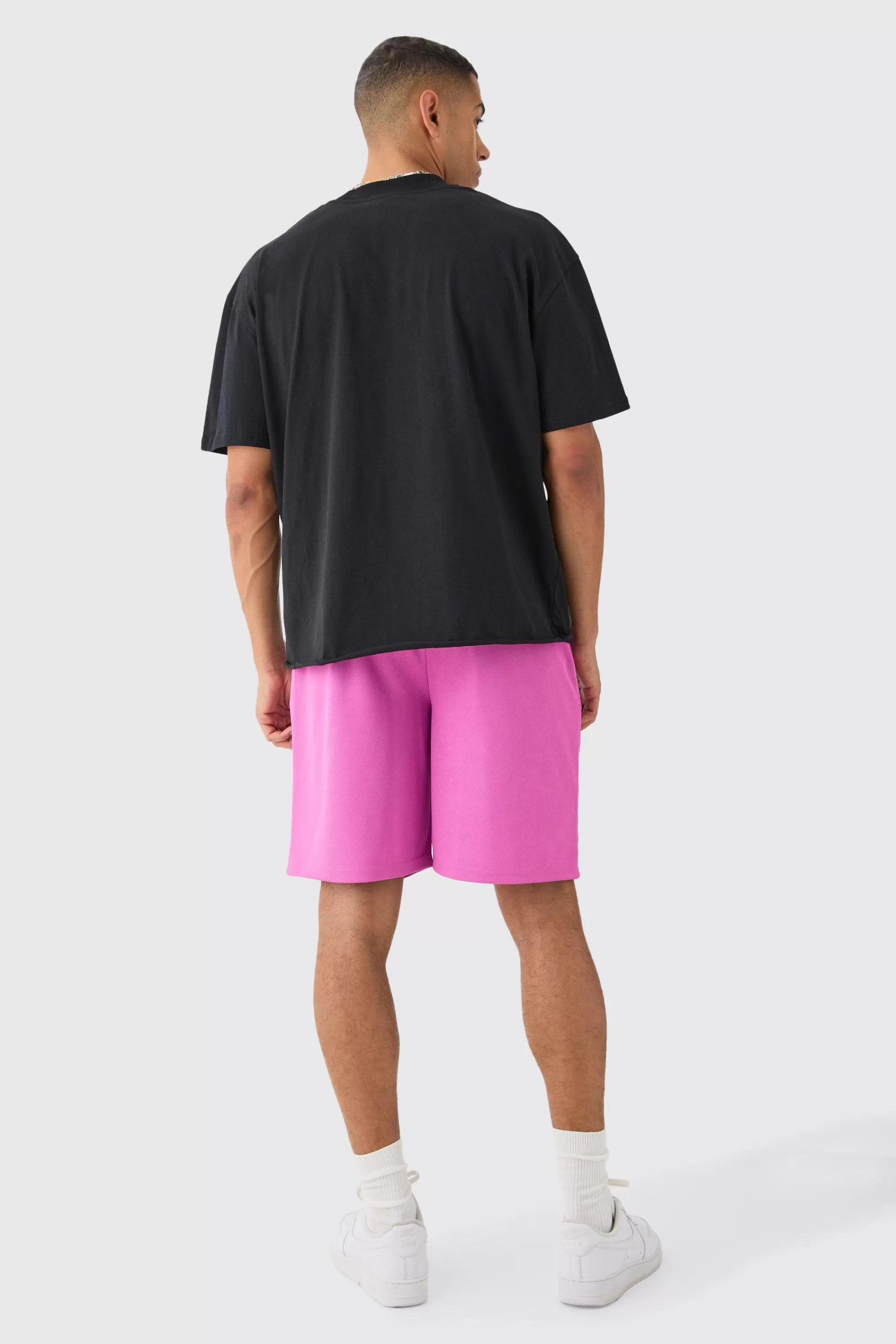 boohooMAN Oversized Extended Neck Raw Hem Skeleton T-shirt And Mesh Shorts Set | UK