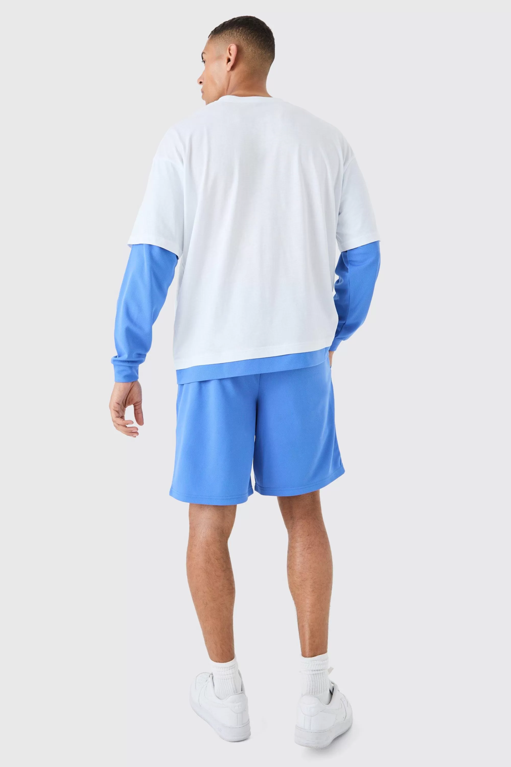 boohooMAN Oversized Faux Layer T-shirt And Mesh Short Set | UK