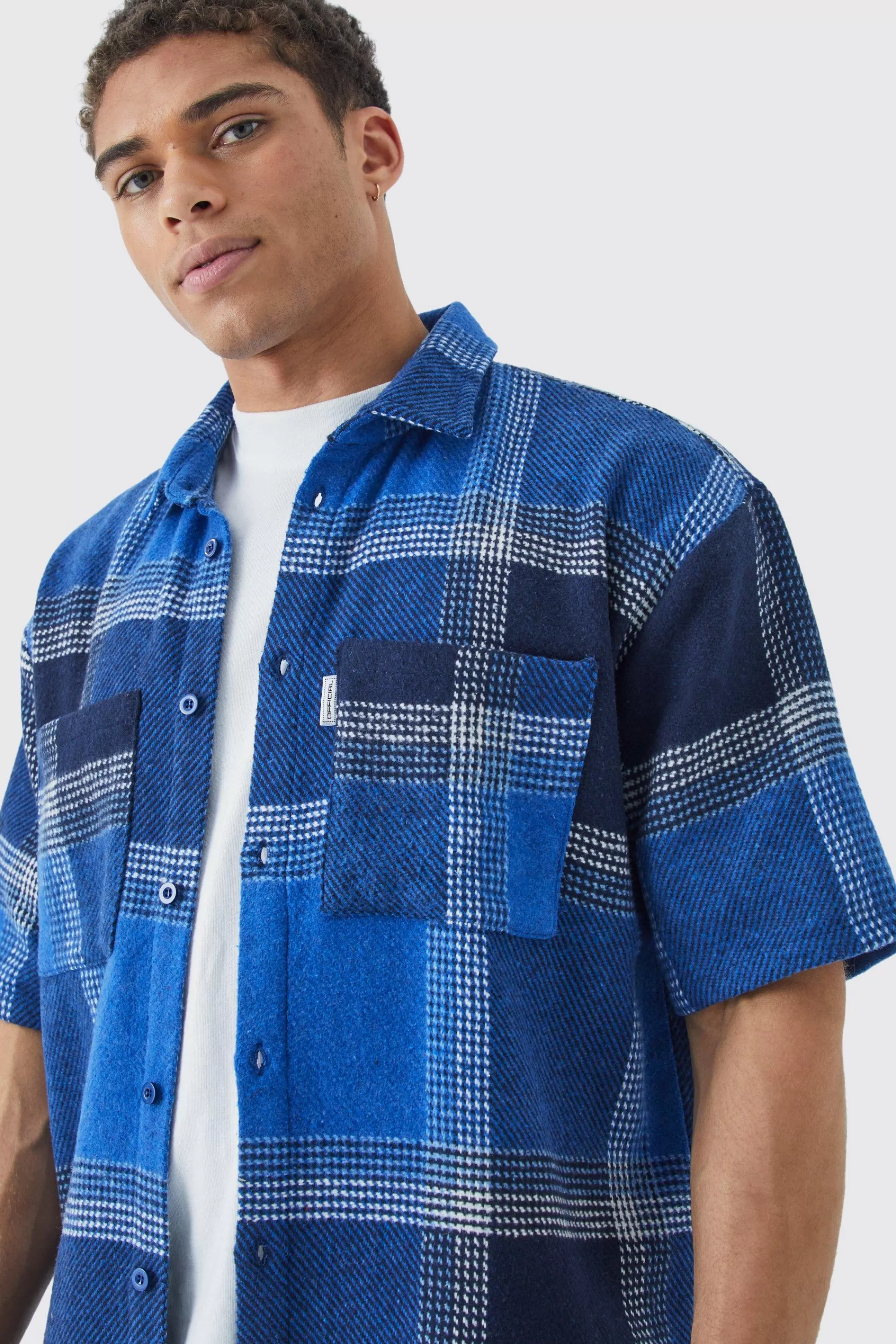 boohooMAN Oversized Fleece Woven Tab Check Overshirt | UK