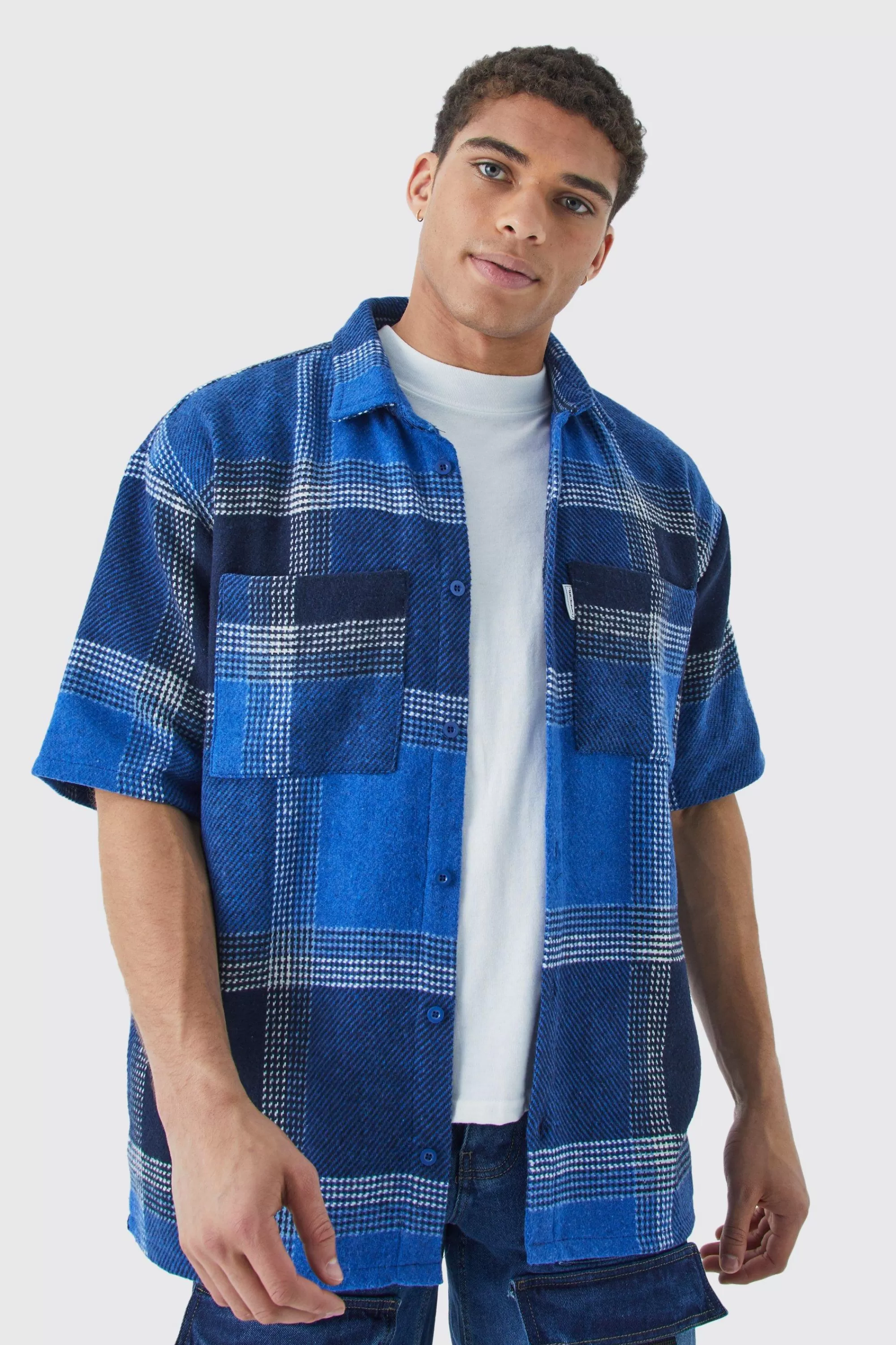 boohooMAN Oversized Fleece Woven Tab Check Overshirt | UK