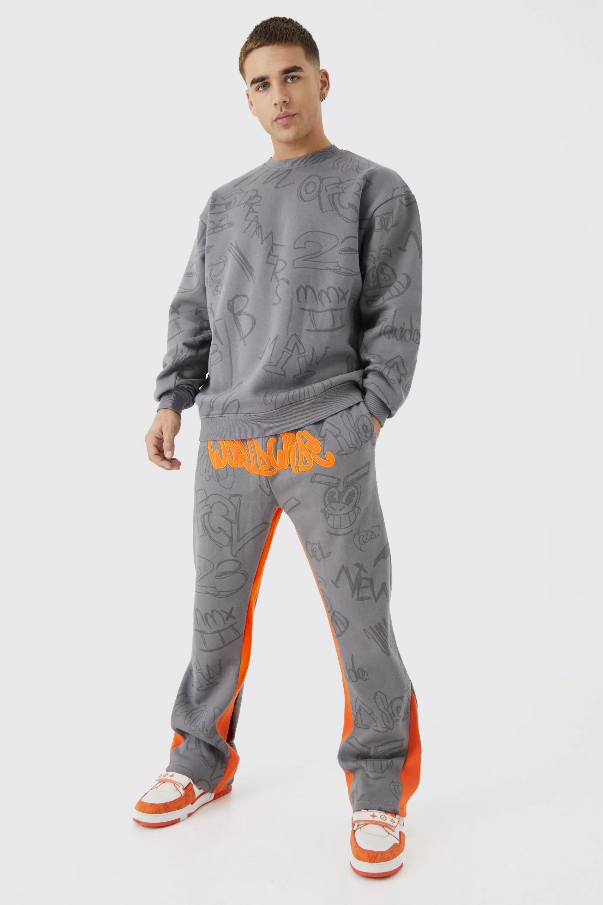 boohooMAN Oversized Graffiti Applique Gusset Tracksuit | UK