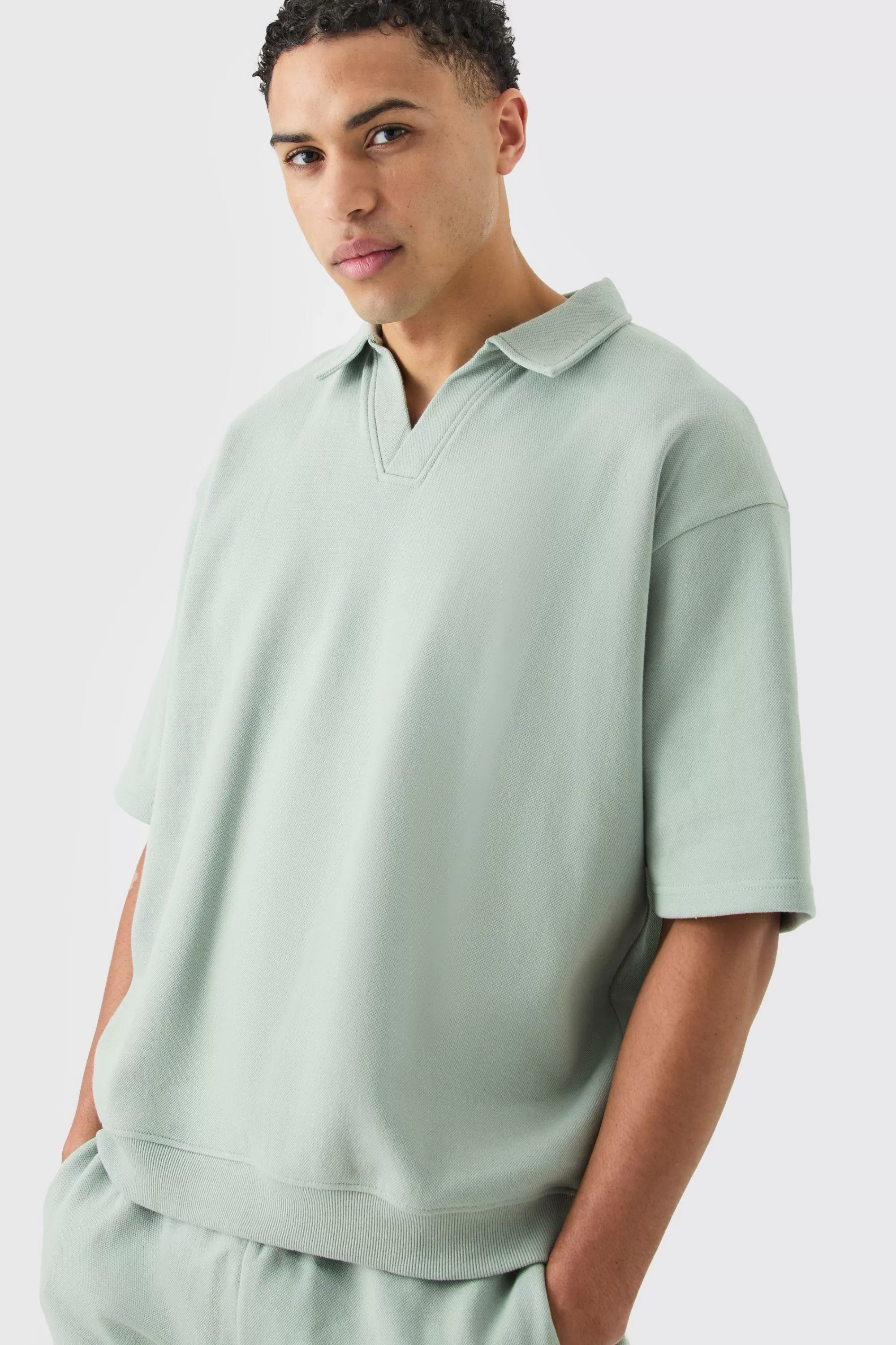boohooMAN Oversized Half Sleeve Revere Elastic Hem Polo And Short Set | UK