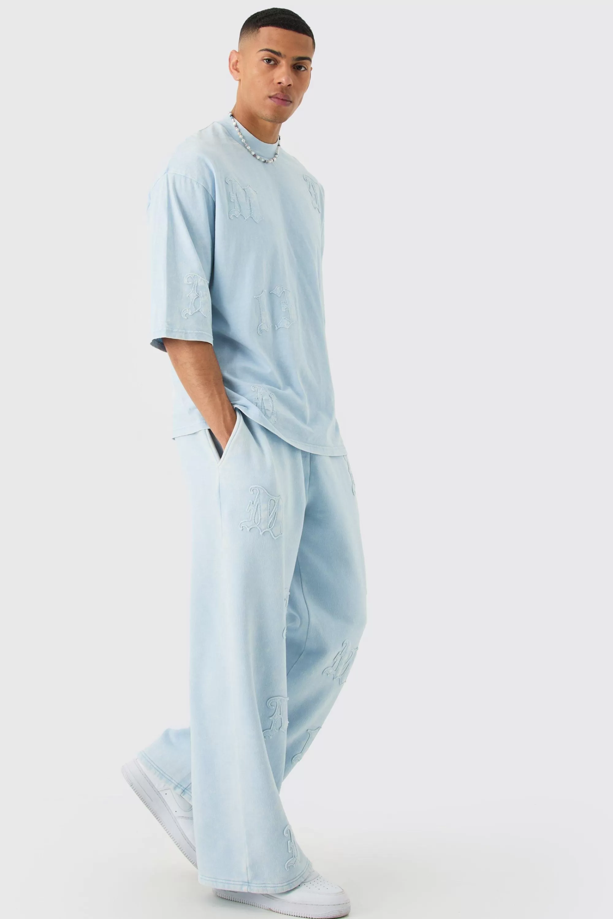 boohooMAN Oversized Heavyweight Half Sleeve Acid Applique Tracksuit | UK