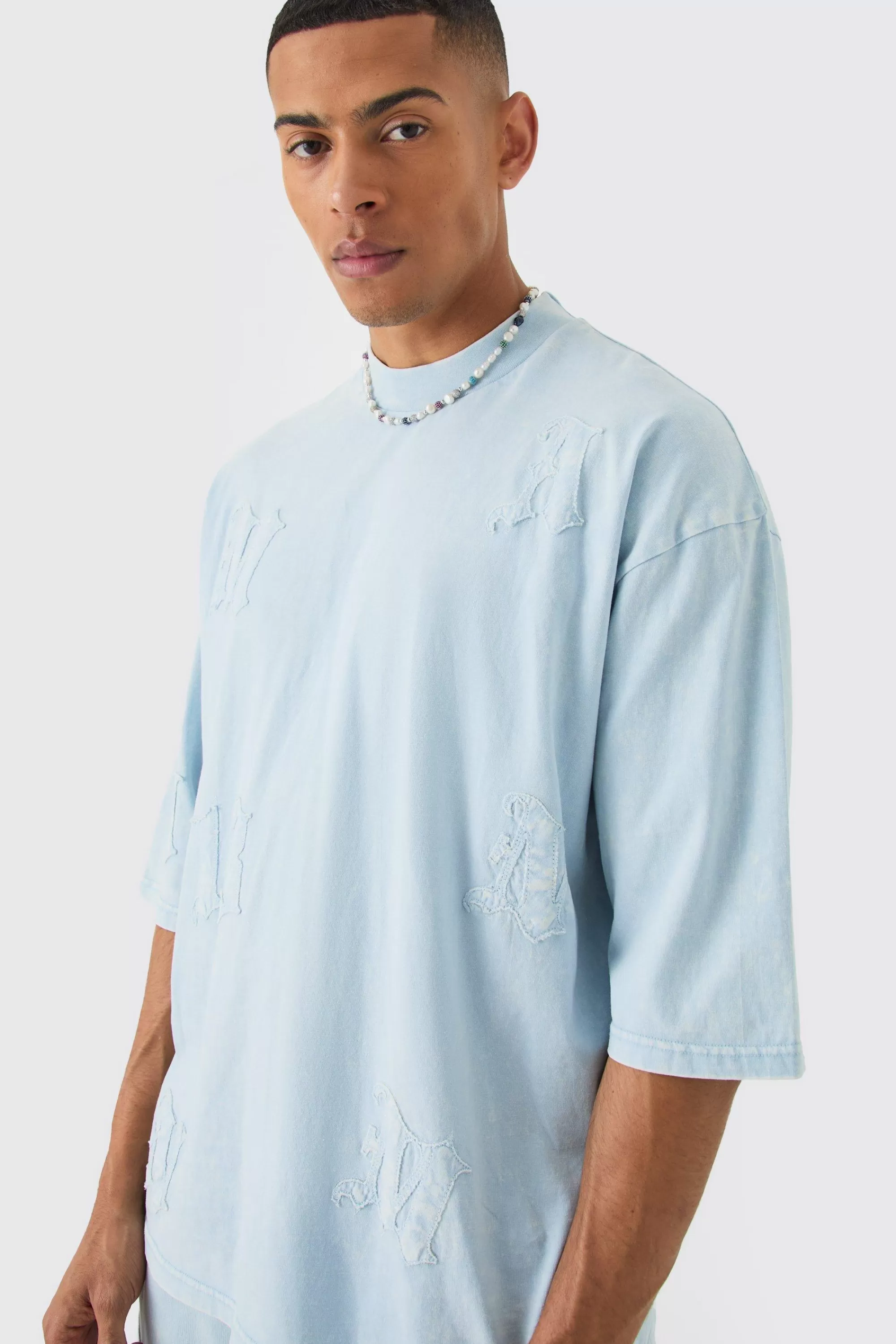 boohooMAN Oversized Heavyweight Half Sleeve Acid Applique Tracksuit | UK