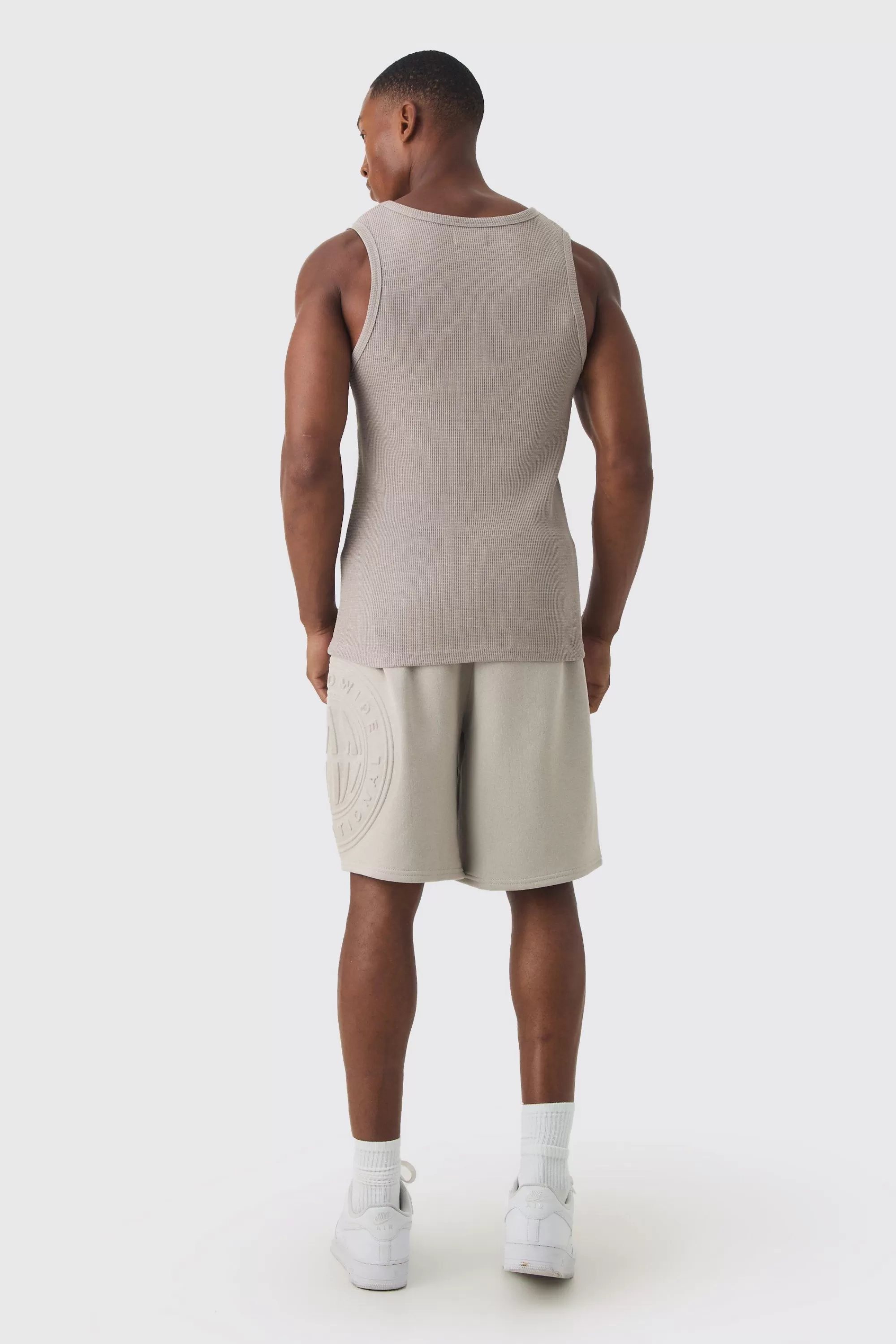 boohooMAN Oversized Long Length Worldwide Embossed Short | UK