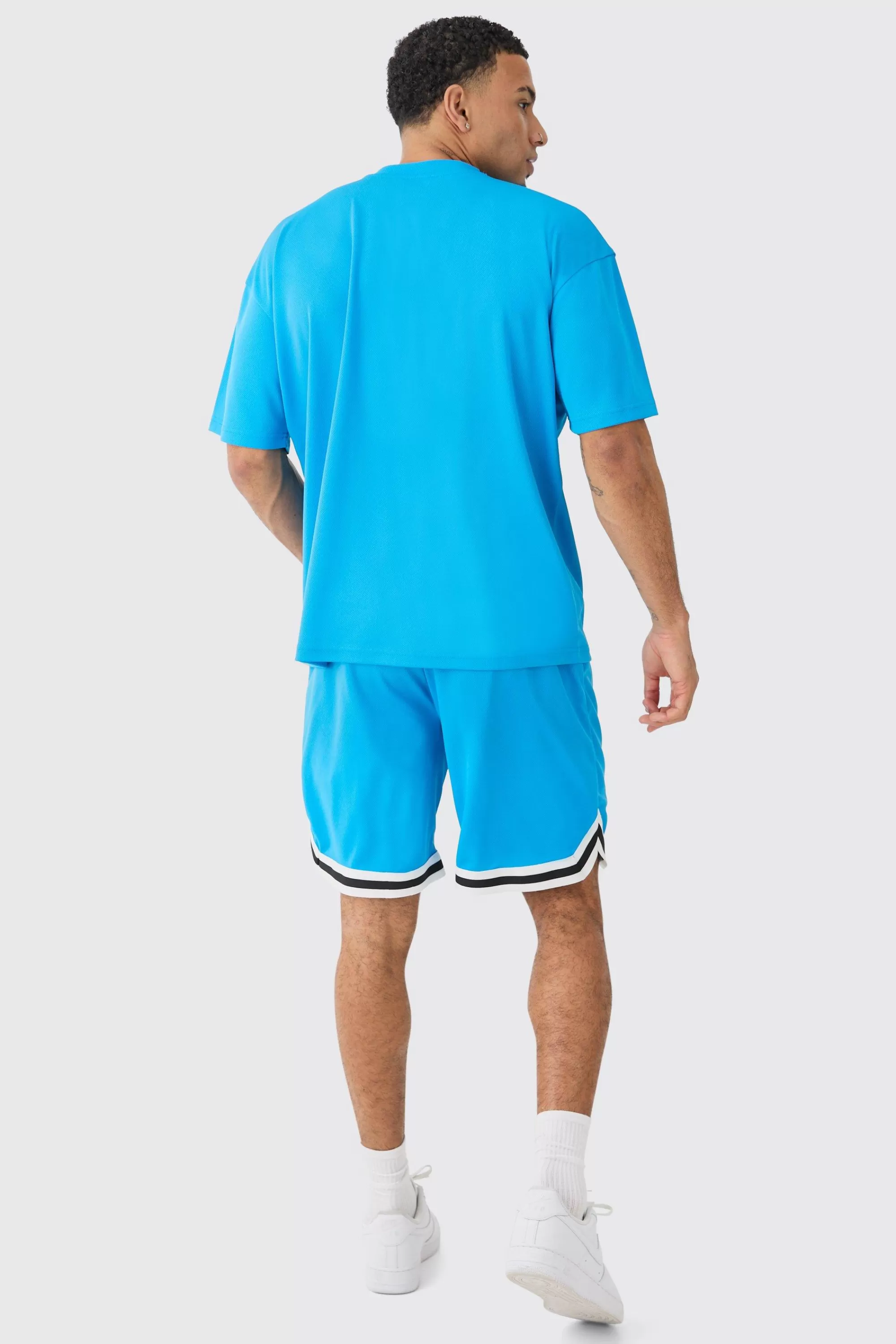 boohooMAN Oversized Man Mesh Varsity Top And Basketball Shorts Set | UK
