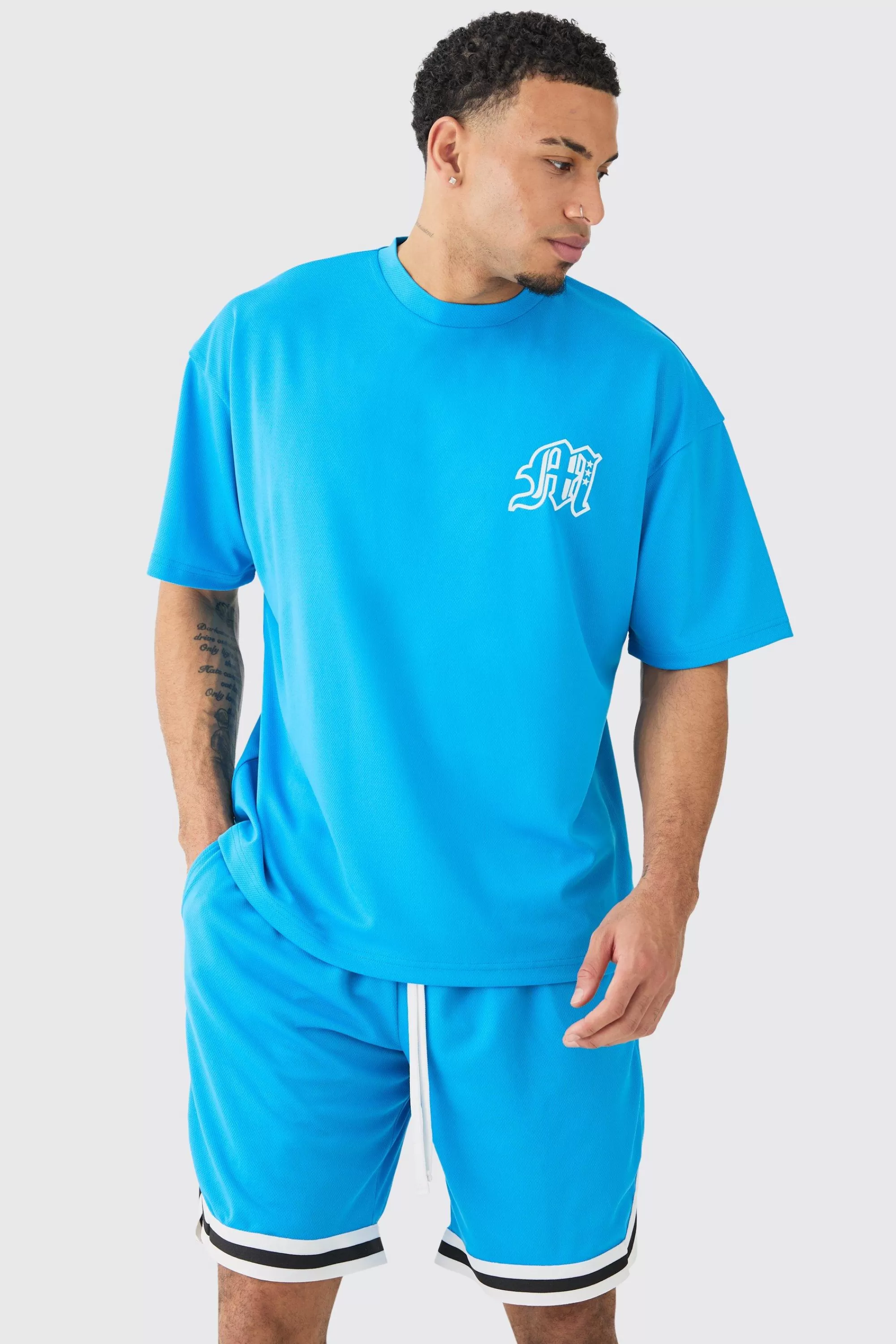 boohooMAN Oversized Man Mesh Varsity Top And Basketball Shorts Set | UK