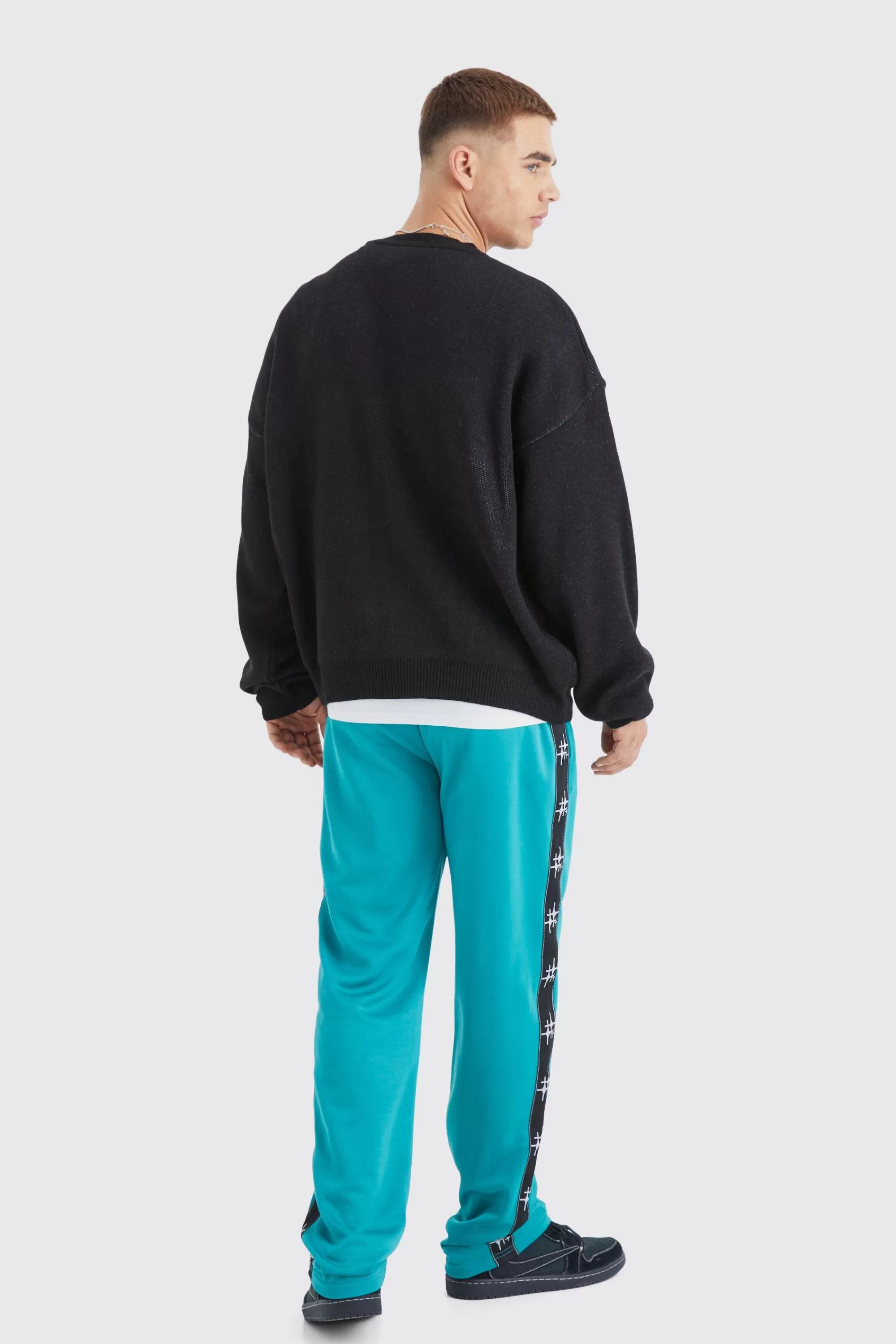 boohooMAN Oversized Tape Side Tricot Jogger | UK
