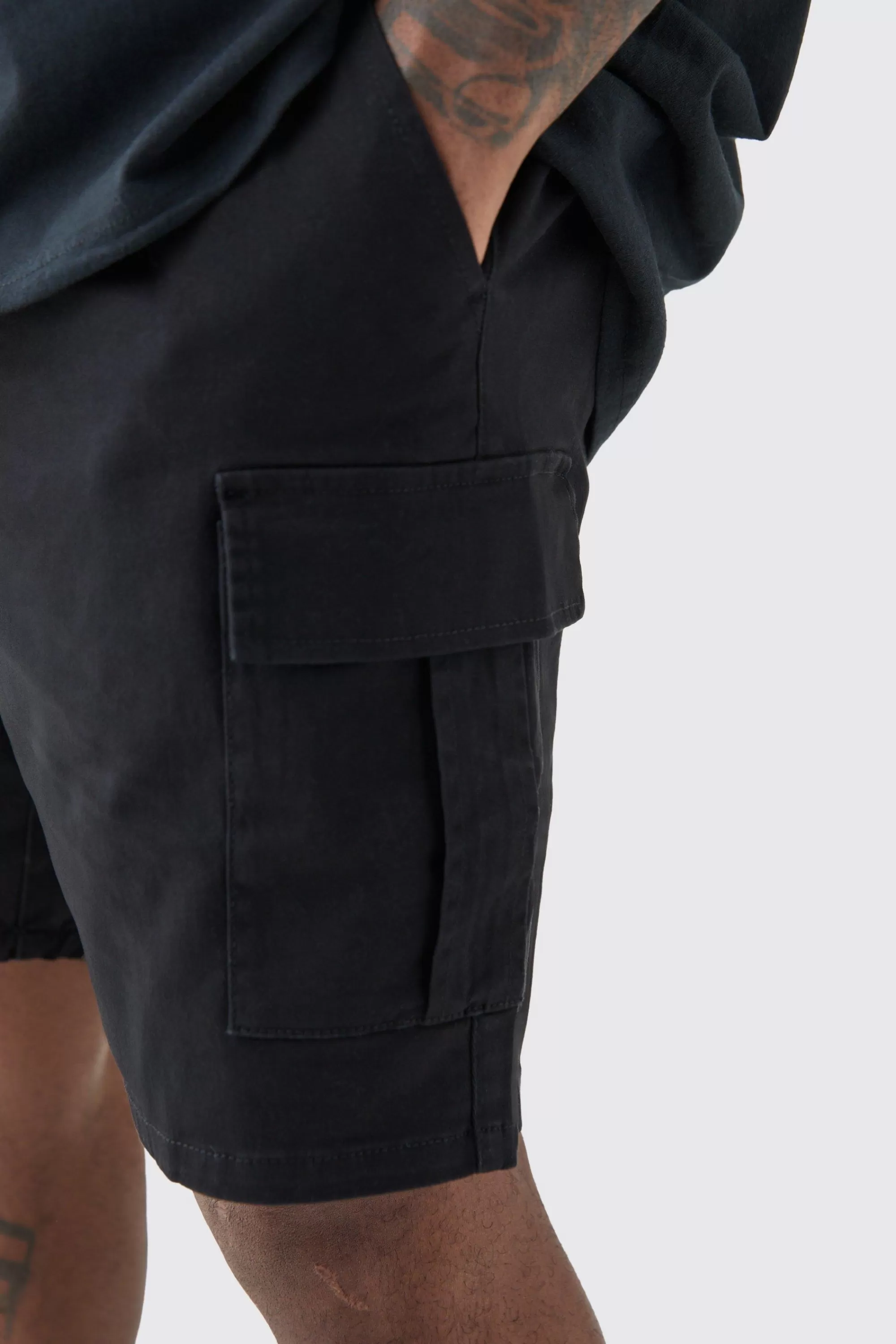 boohooMAN Plus Elasticated Waist Skinny Fit Cargo Shorts | UK