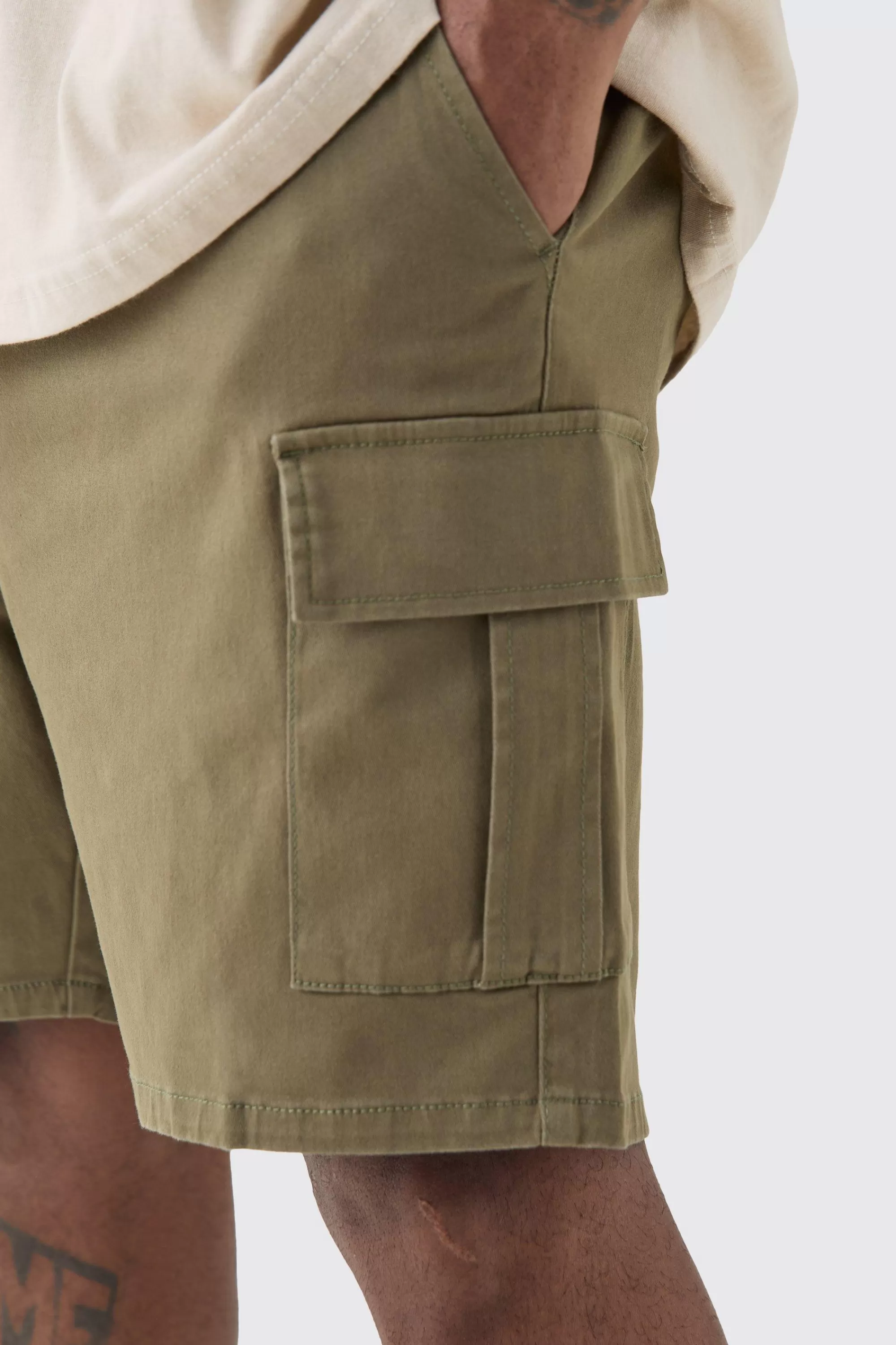 boohooMAN Plus Elasticated Waist Skinny Fit Cargo Shorts | UK