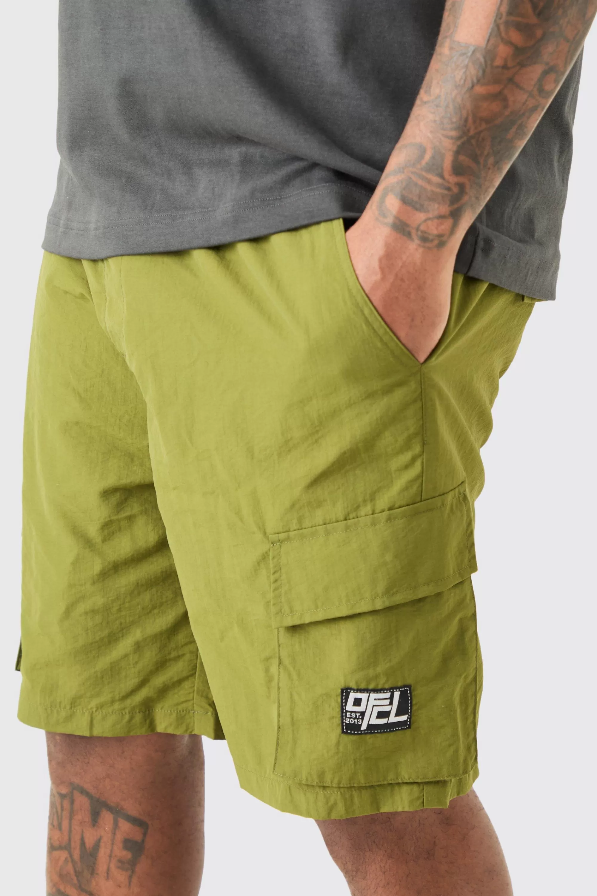 boohooMAN Plus Elasticated Waist Ofcl Nylon Cargo Short | UK