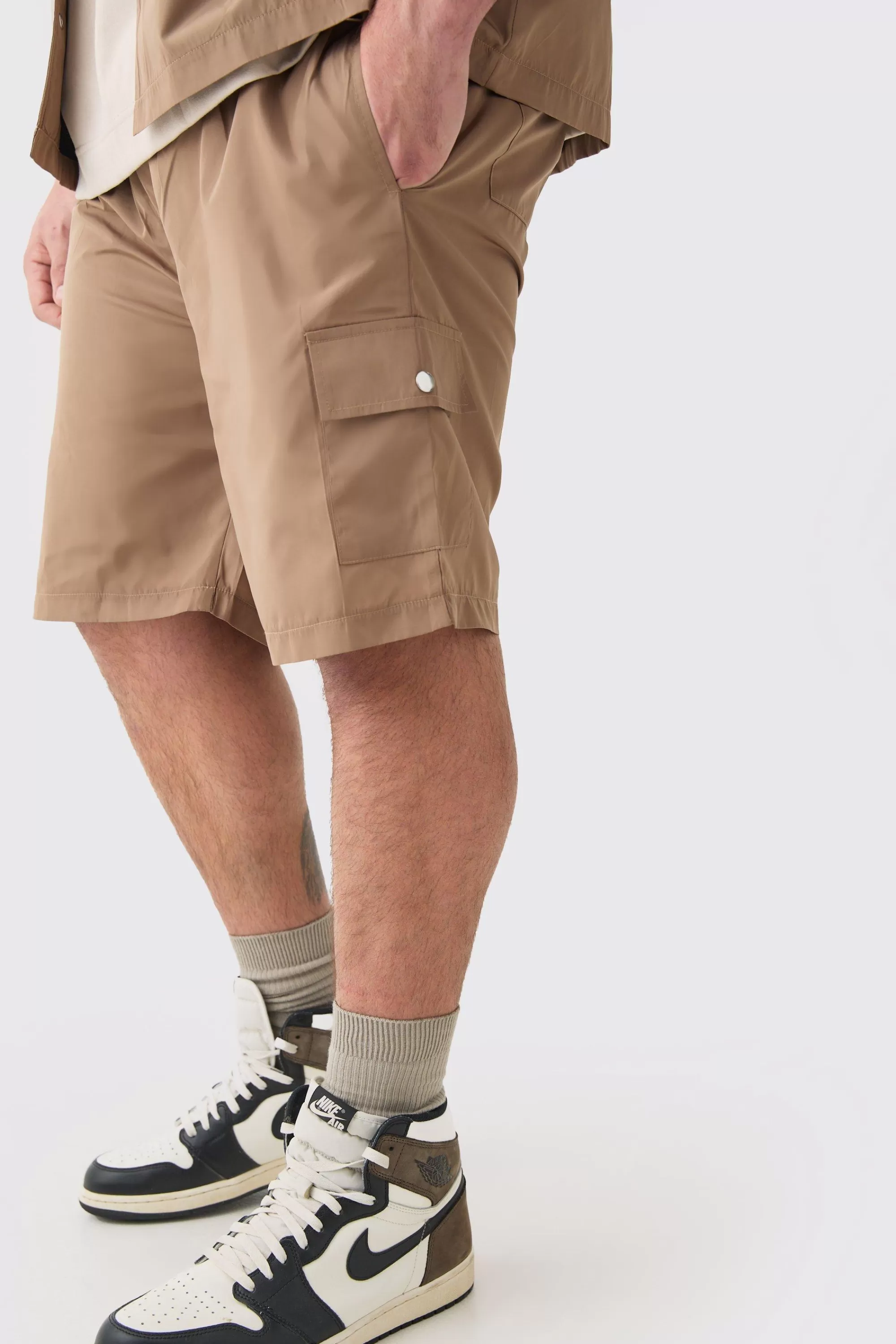 boohooMAN Plus Elasticated Waist Relaxed Nylon Man Cargo Short | UK