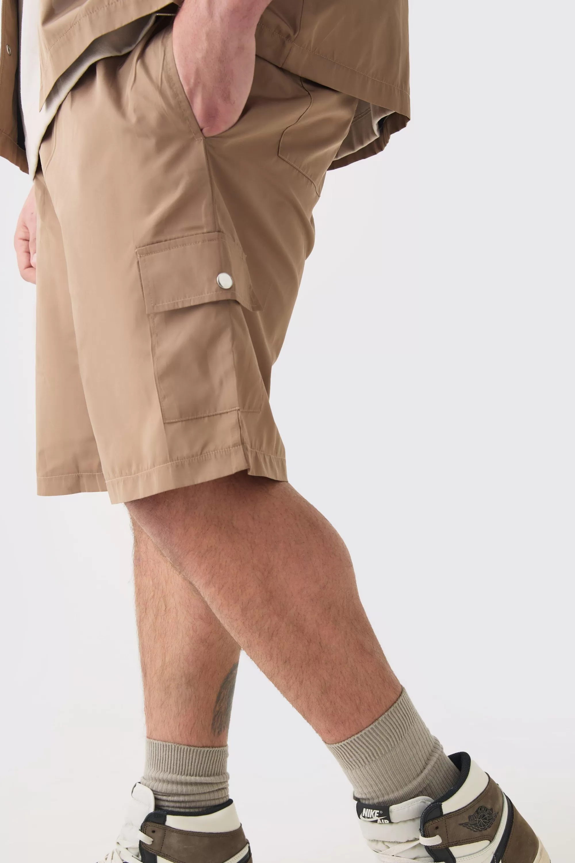 boohooMAN Plus Elasticated Waist Relaxed Nylon Man Cargo Short | UK