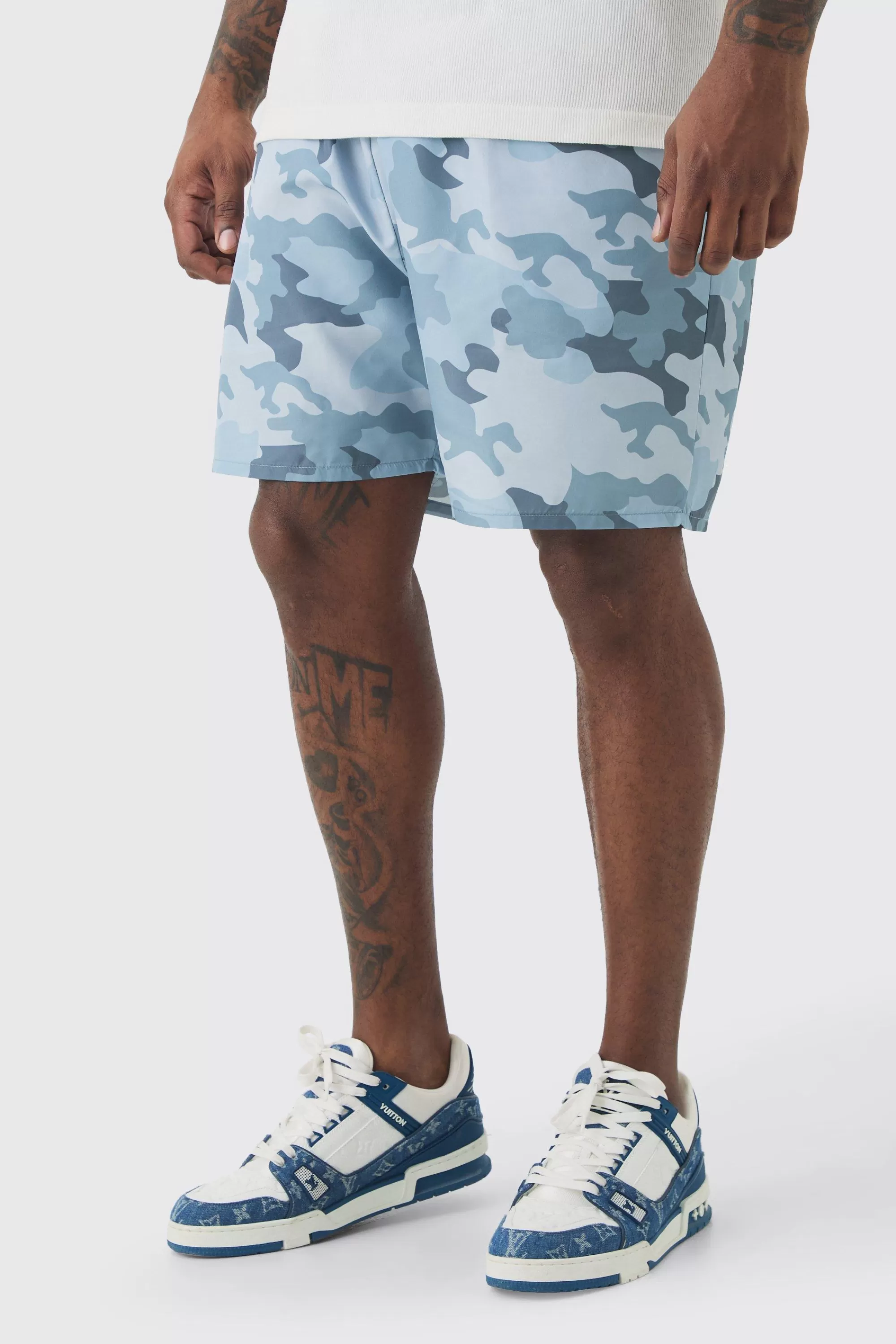 boohooMAN Plus Camo Printed Swim Shorts | UK