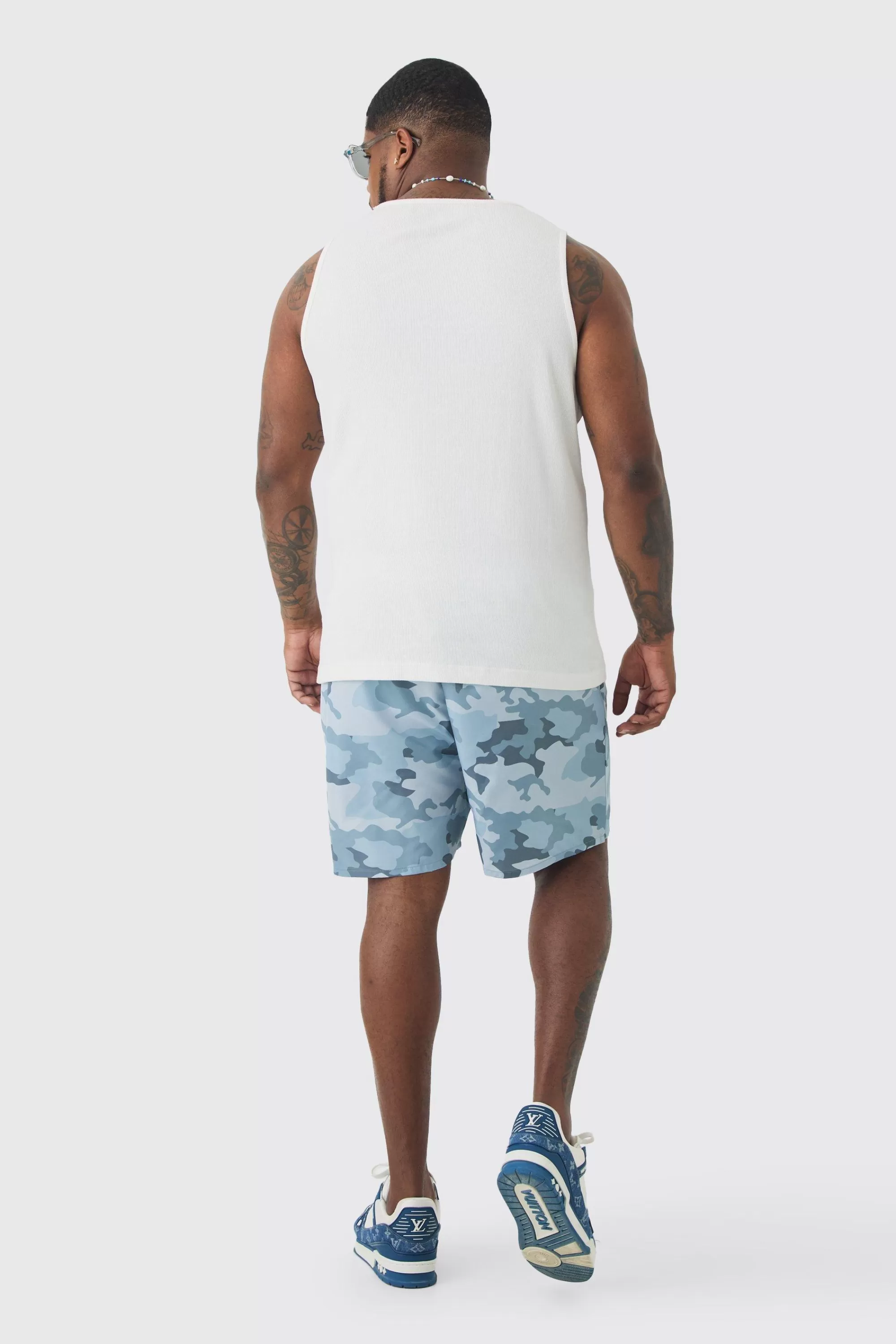 boohooMAN Plus Camo Printed Swim Shorts | UK