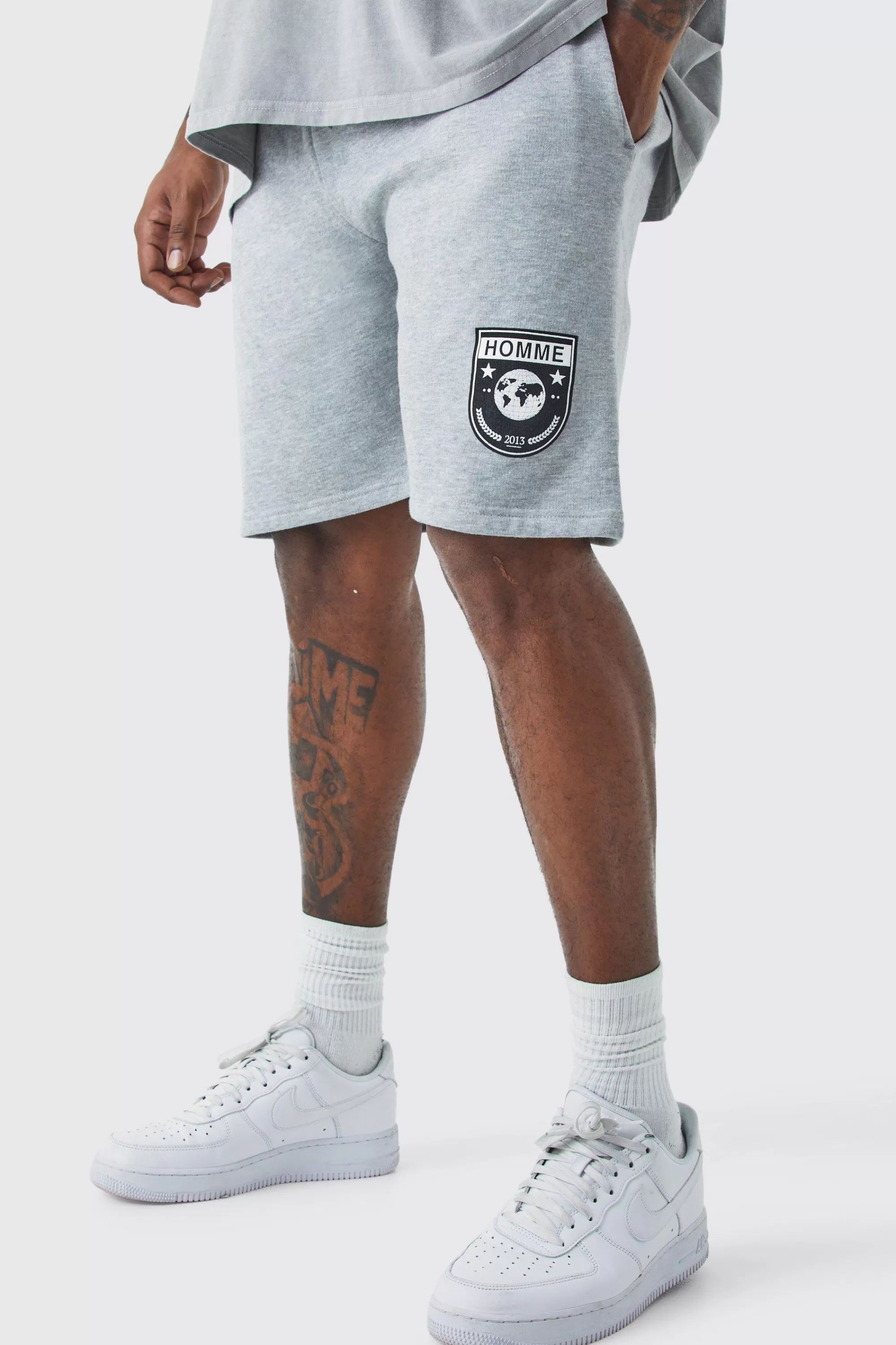 boohooMAN Plus Loose Fit Team Homme Short In | UK