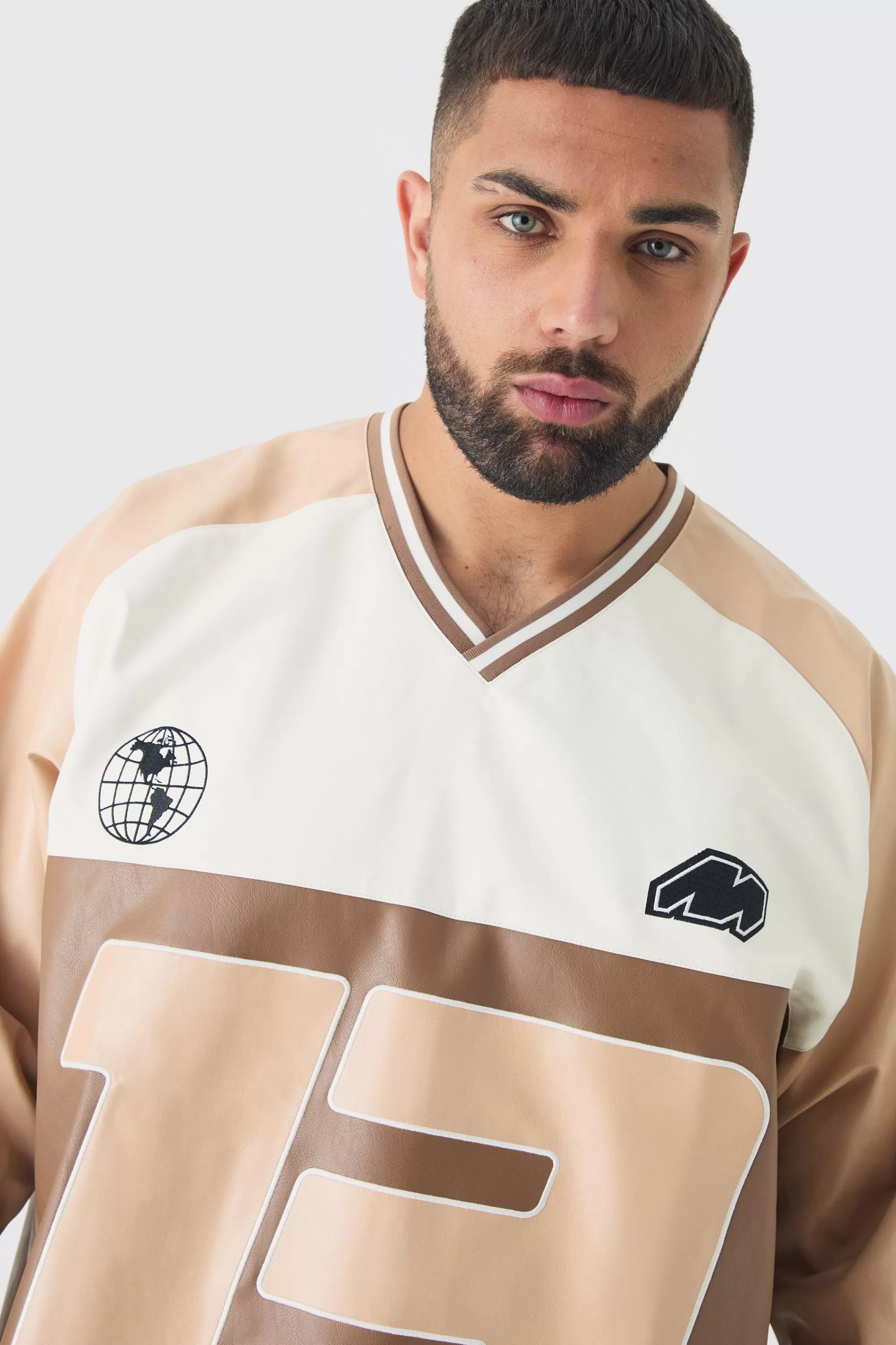 boohooMAN Plus Oversized PU Raglan Embroidered Varsity Shirt | UK