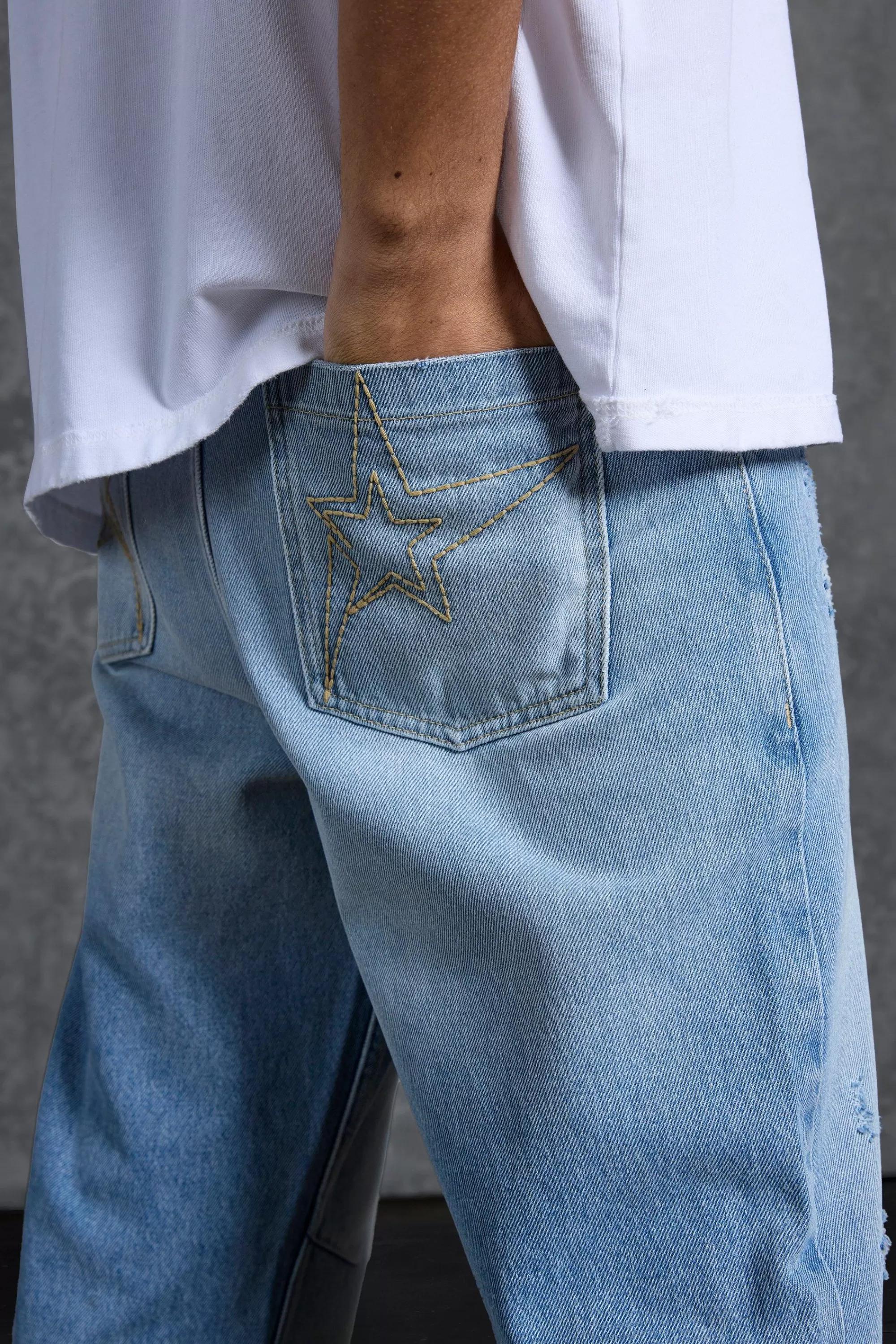 boohooMAN P-Star Slim Fit Flare Stacked Jeans With Distressing | UK