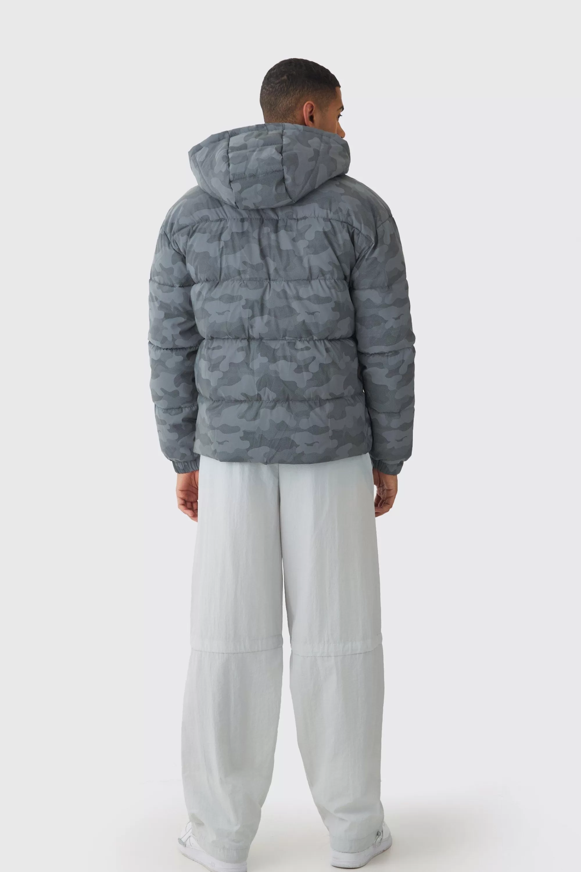 boohooMAN Reflective Camo Hooded Puffer Coat | UK