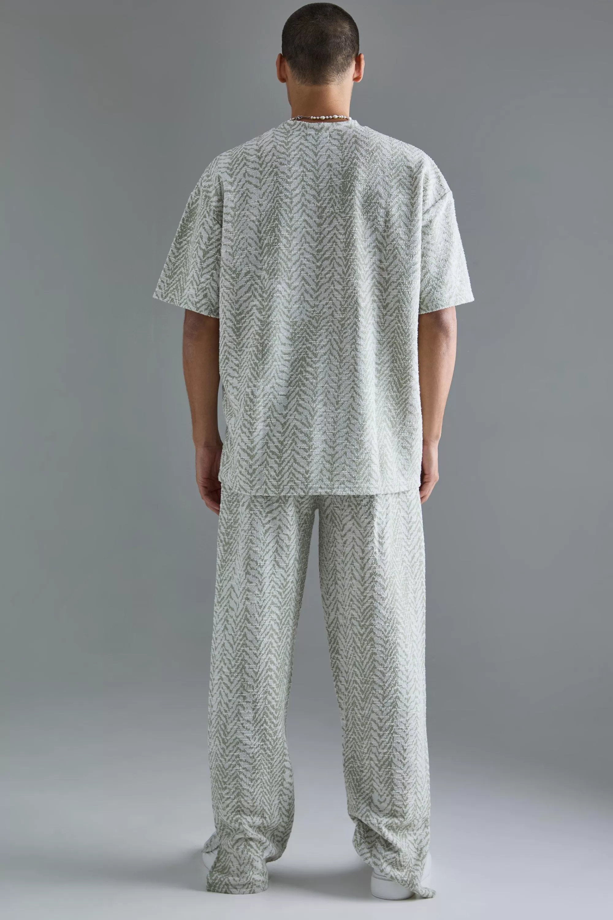 boohooMAN Regular Fit Split Hem Jacquard Trousers | UK