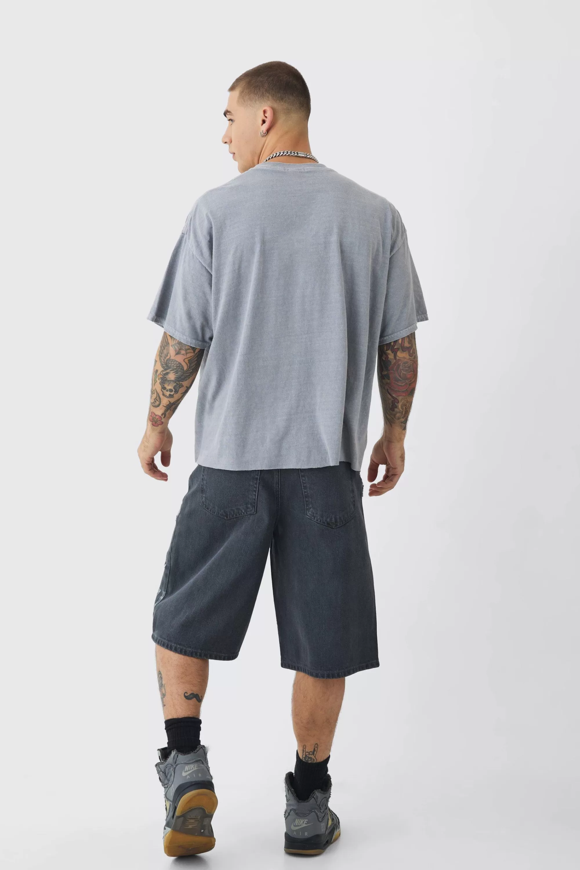 boohooMAN Regular Rigid Official Distressed Denim Jorts In | UK