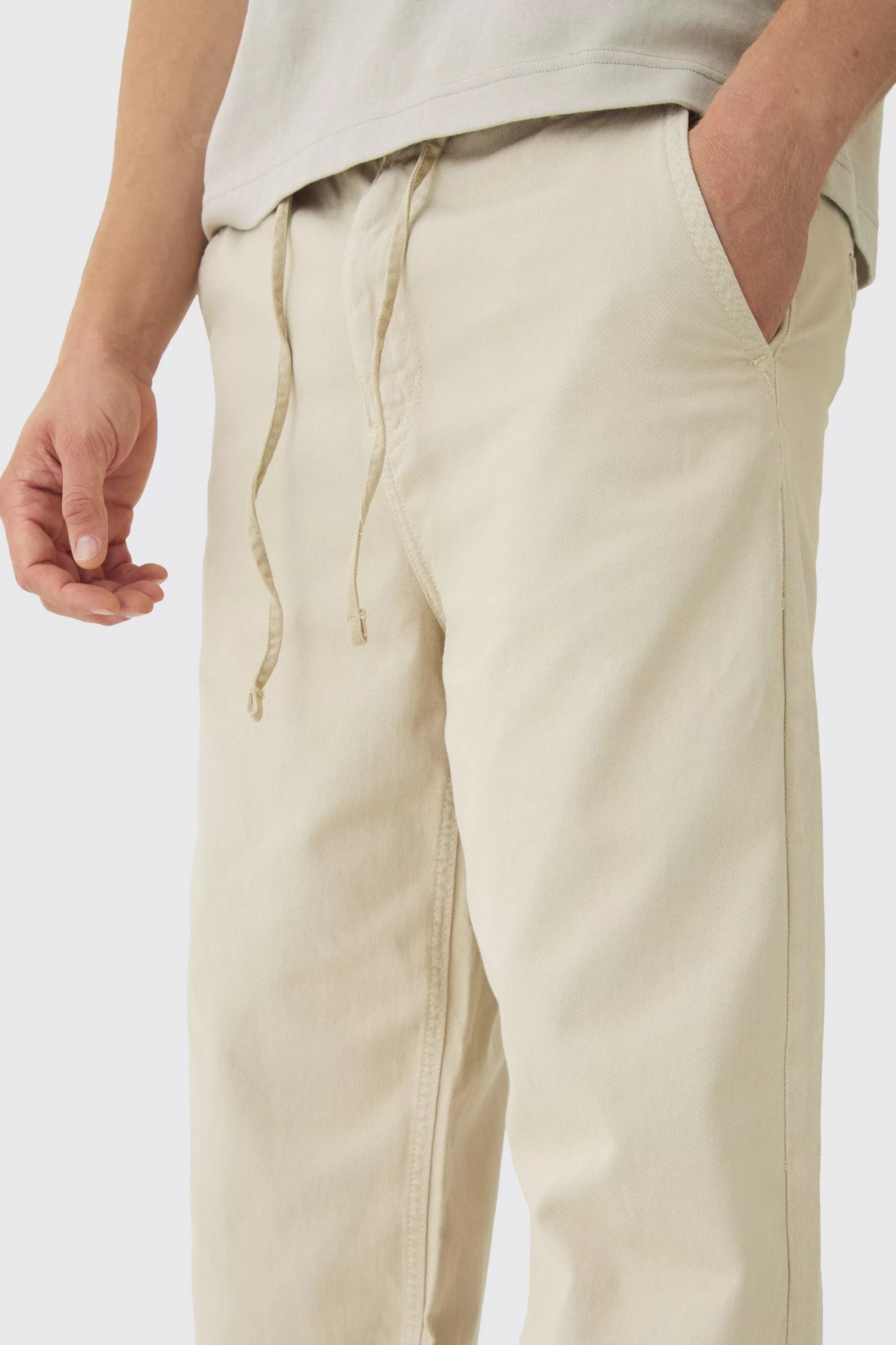 boohooMAN Relaxed Chinos With Drawcords In | UK
