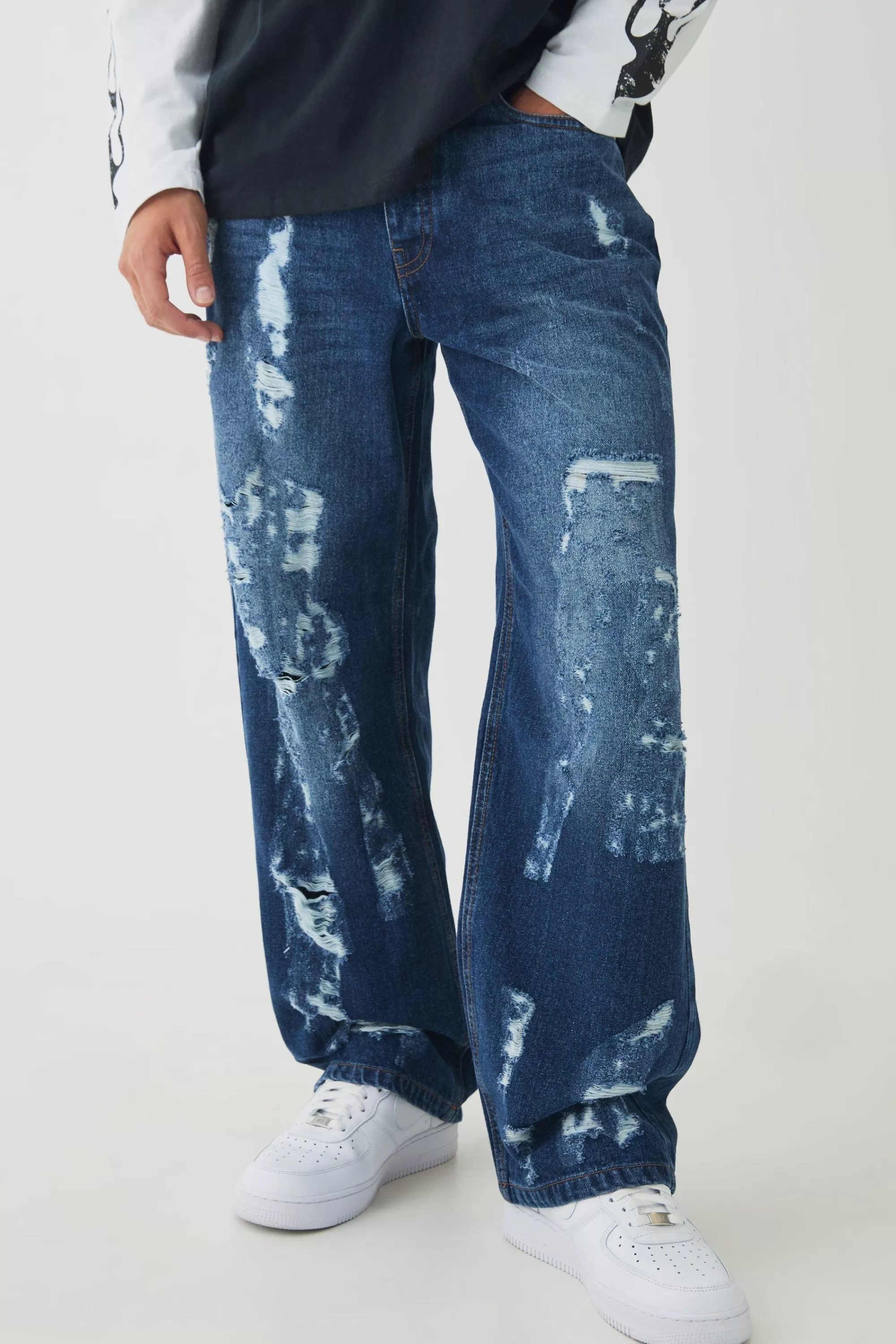 boohooMAN Relaxed Distressed Nibbled Jeans | UK